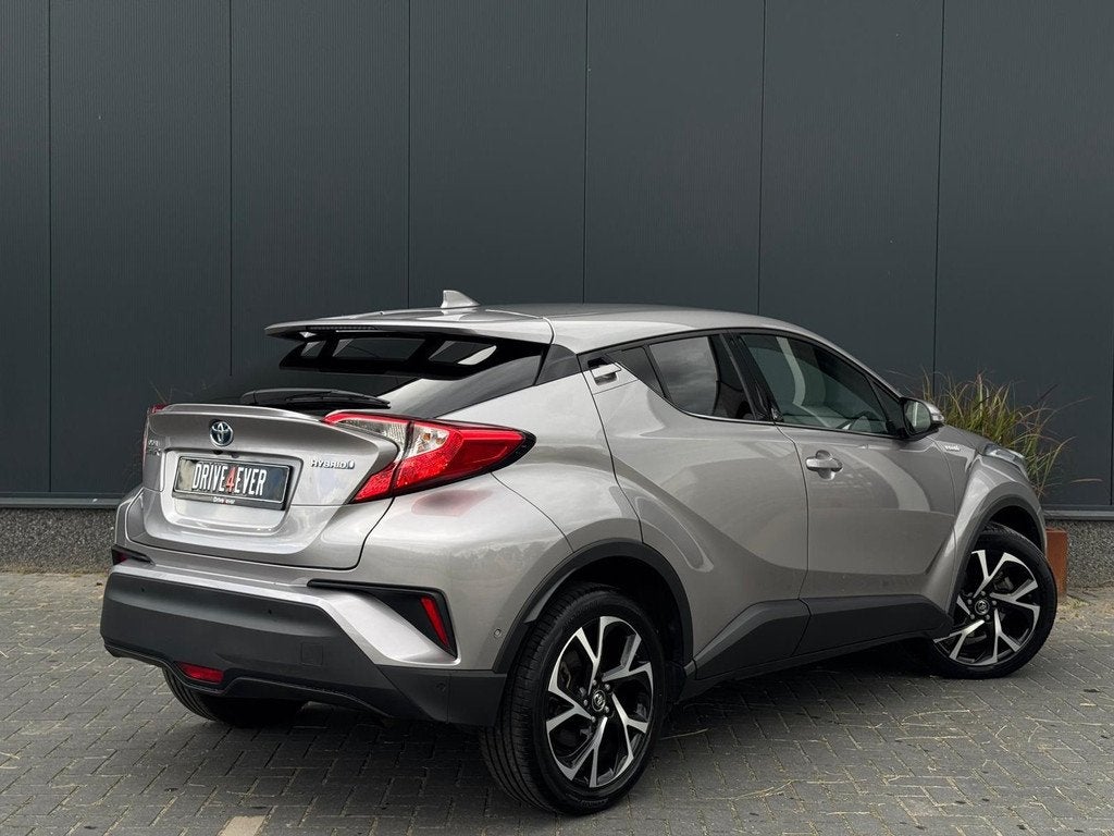 Toyota C-HR 1.8 Hybrid Active M20 NAVI | LED | CAMERA | SPOR, Auto's, Stof, 4 cilinders, Met garantie (alle), 98 pk