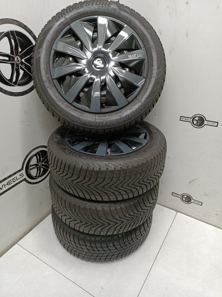 Opel staal velgen 16 winterbanden en met wieldoppen 5x110, Ophalen, Gebruikt, 16 inch, Banden en Velgen