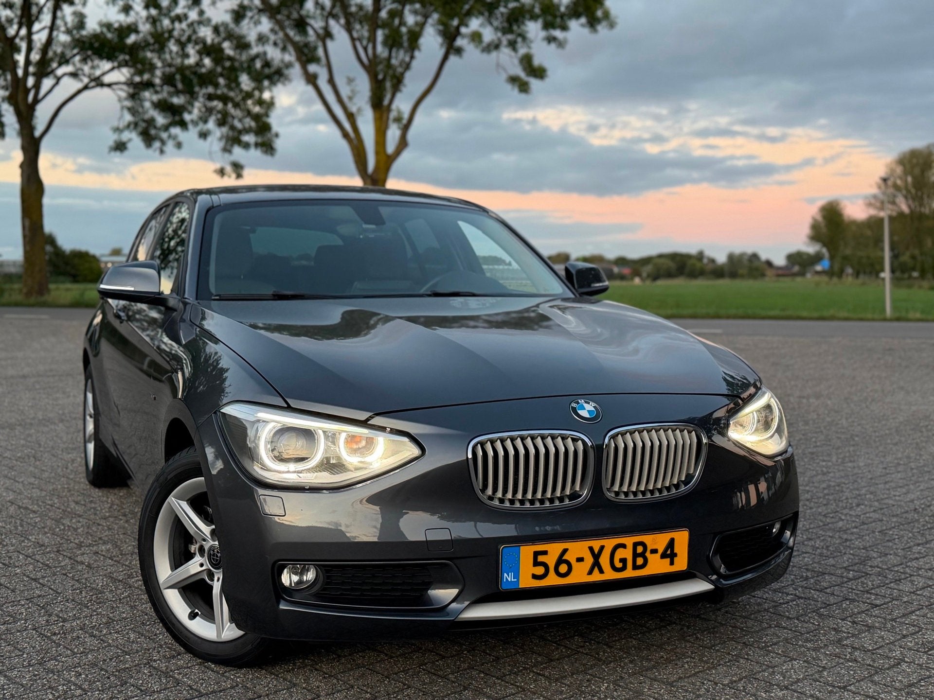 BMW 1-serie 116i Urban-Line 5D (bj 2012) NAVI|BI-XENON|LMV|A, Auto's, 1-Serie, Euro 5, Gebruikt, Zwart