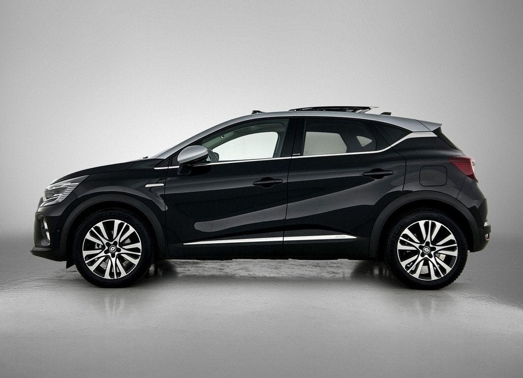 Renault Captur 1.6 E-Tech Plug-in Hybrid 160 Initiale Paris, Gebruikt, 4 cilinders, Zwart, Bedrijf
