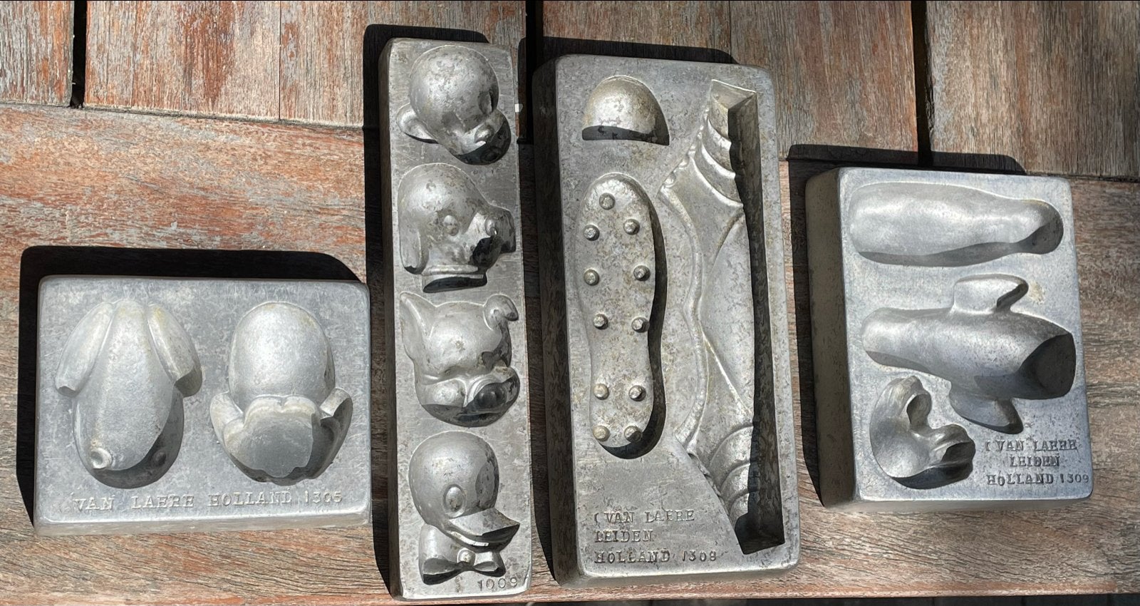 Set van 4 oude marsepeinmallen Carel van Laere uit Leiden, Antiek en Kunst, Curiosa en Brocante, Ophalen of Verzenden