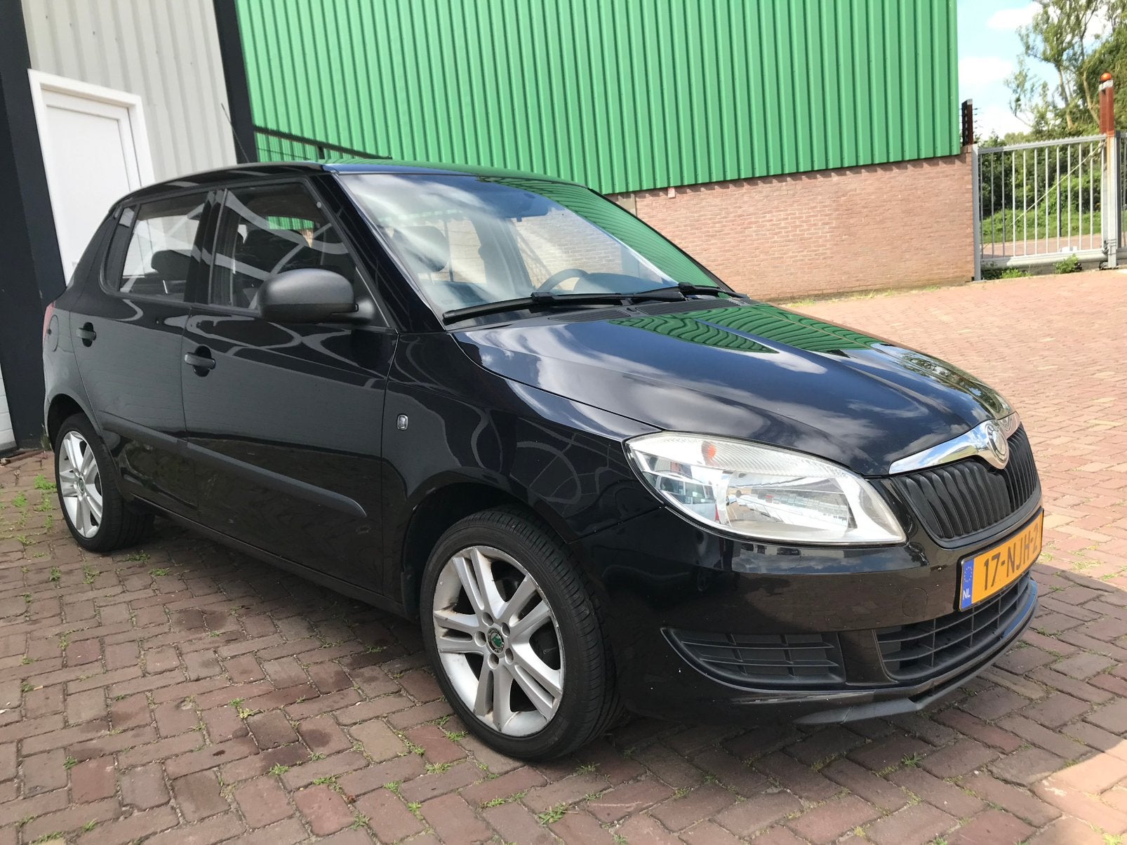 Skoda Fabia 1.2 44KW 2010 Zwart, Voorwielaandrijving, 40 €/maand, 990 kg, 1198 cc