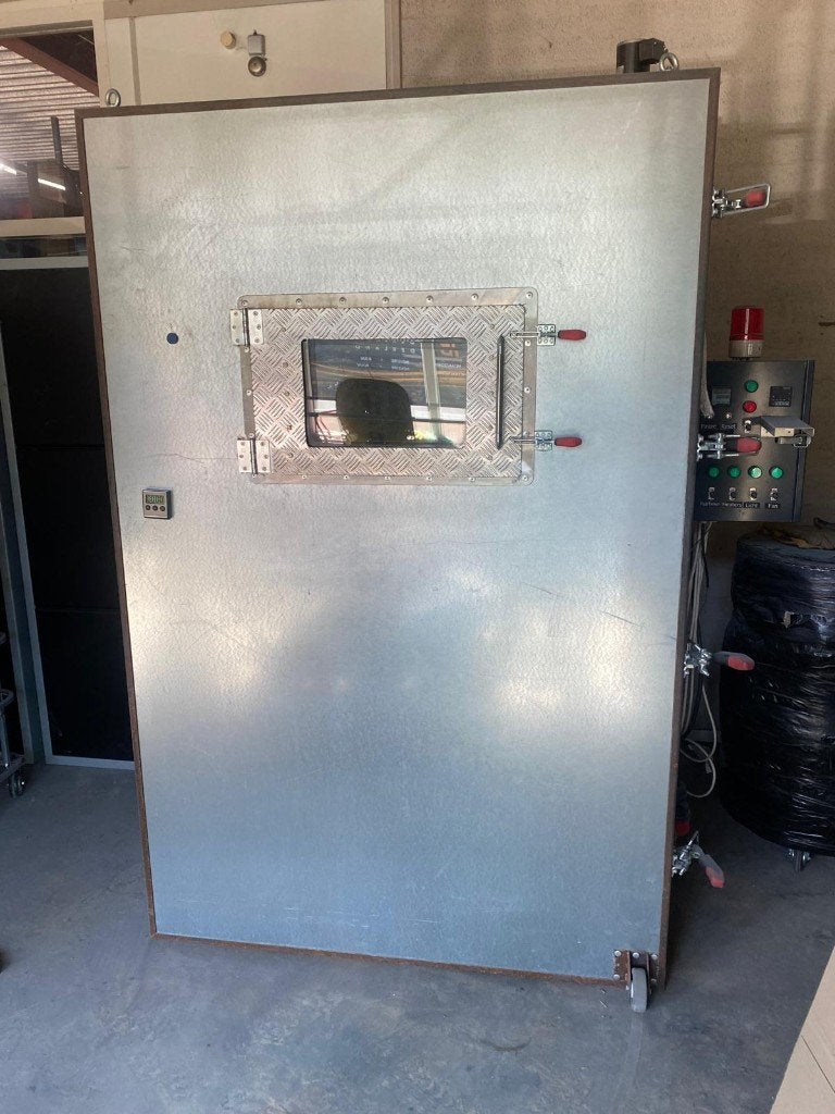 Poedercoat oven straalcabine en afzuigwand, Ophalen