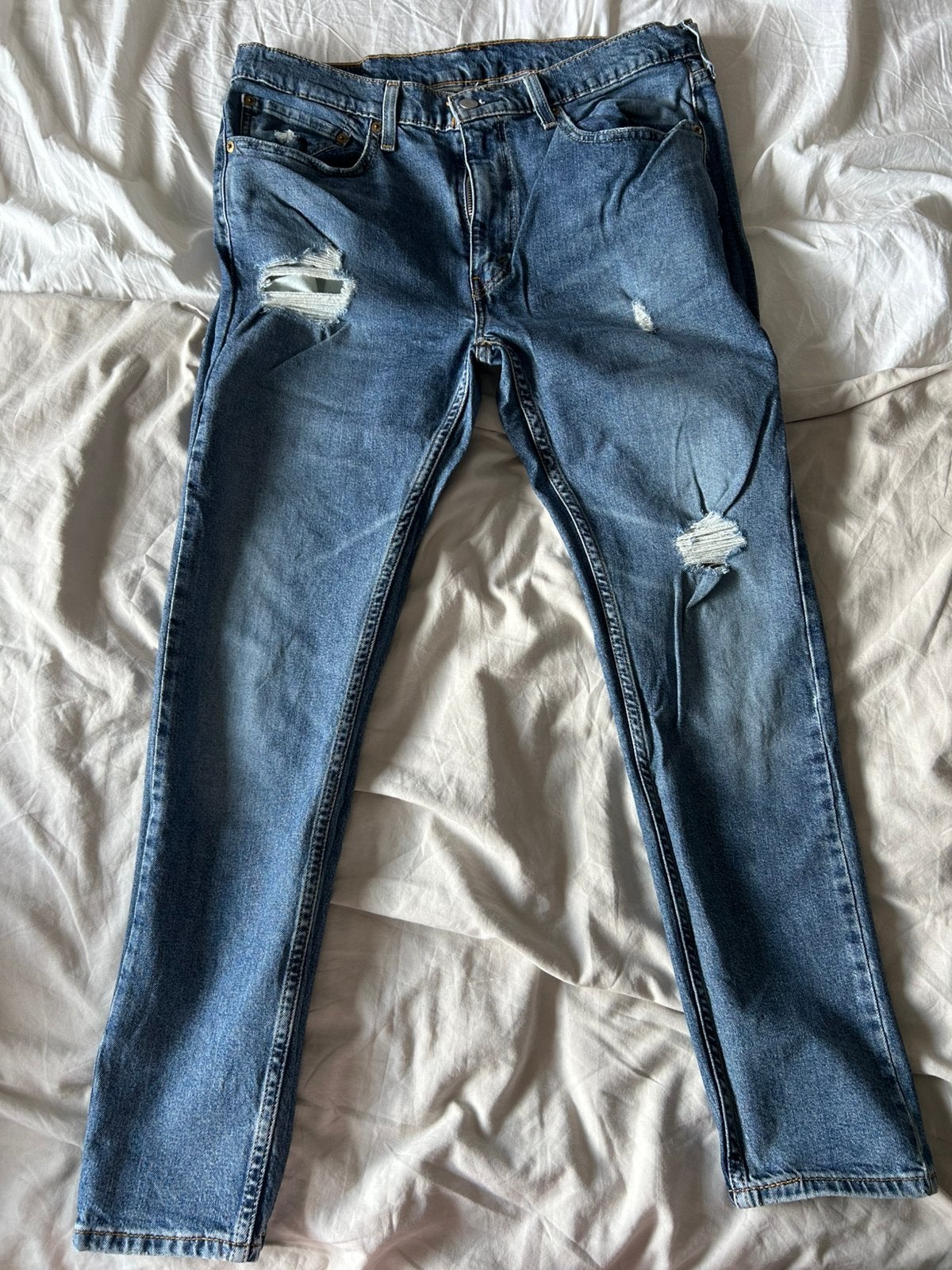 Levi's 519 Skinny jeans maat 36 spijkerbroek met slijtage, Verzenden, Zo goed als nieuw, Blauw, W36 - W38 (confectie 52/54)
