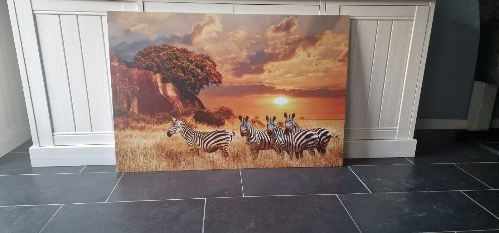 Zebra schilderij van glas, Ophalen