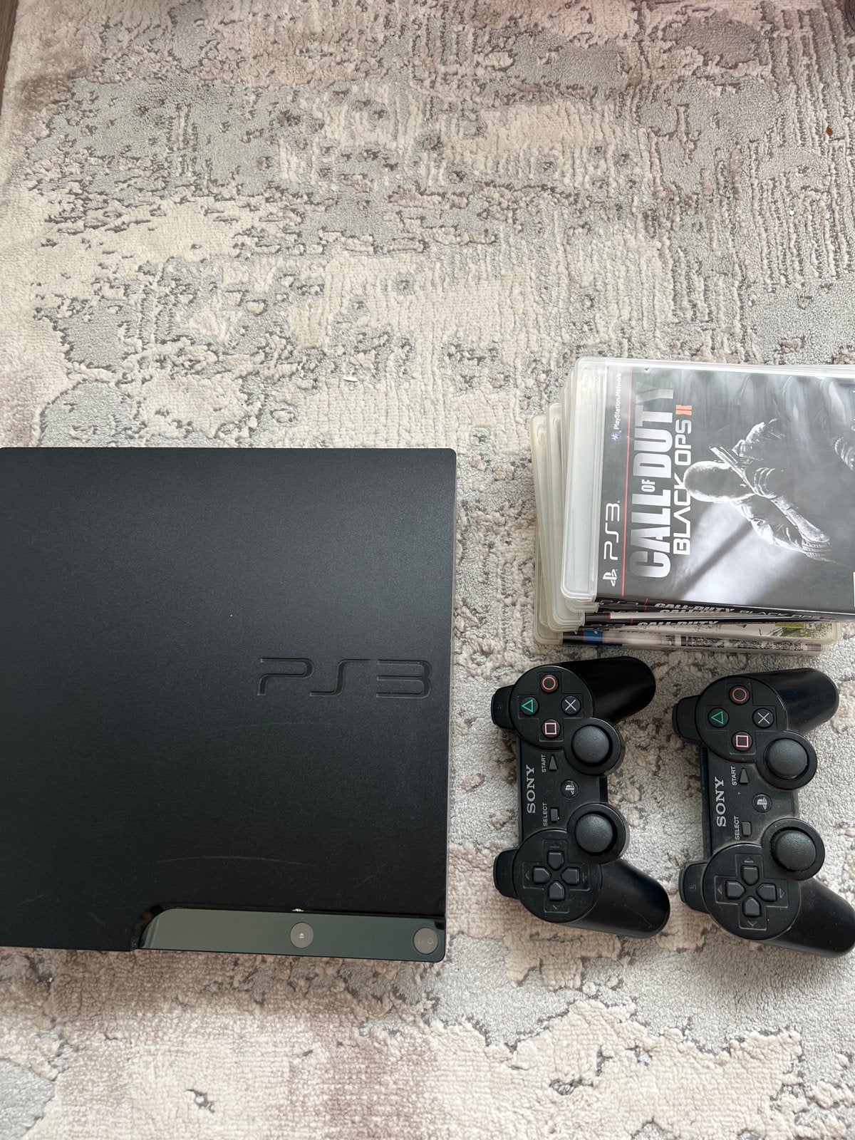 PlayStation 3 slim (PS3) met 2 controllers en 8 games, Spelcomputers en Games, Games | Sony PlayStation 3, Ophalen, Gebruikt, Vanaf 18 jaar