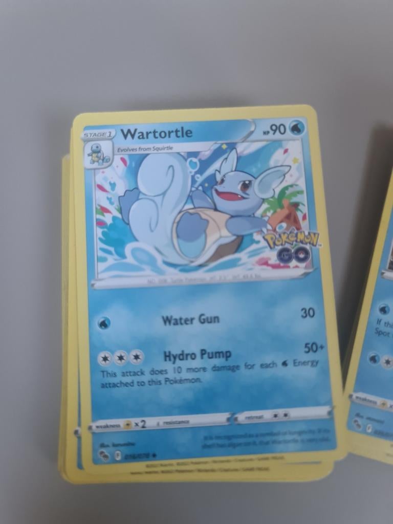 Pokémon Go Kaarten 15 Holofoil/Reverse Holofoil & 43 Normaal, Ophalen of Verzenden