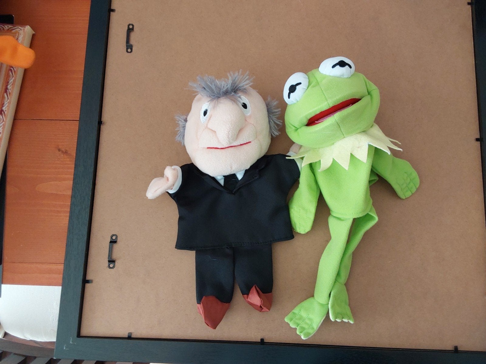 De Muppets handpoppen: Kermit de Kikker en Opa Statler, Ophalen