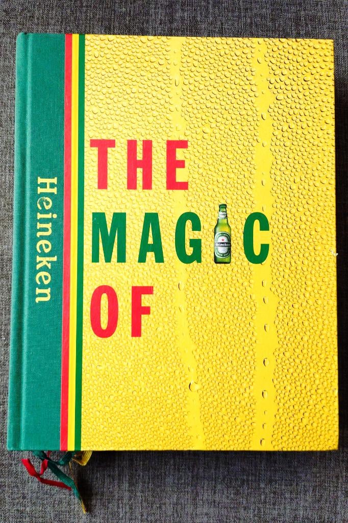 Boek The magic of Heineken, Verzamelen, Ophalen of Verzenden, Zo goed als nieuw, Overige typen, Heineken