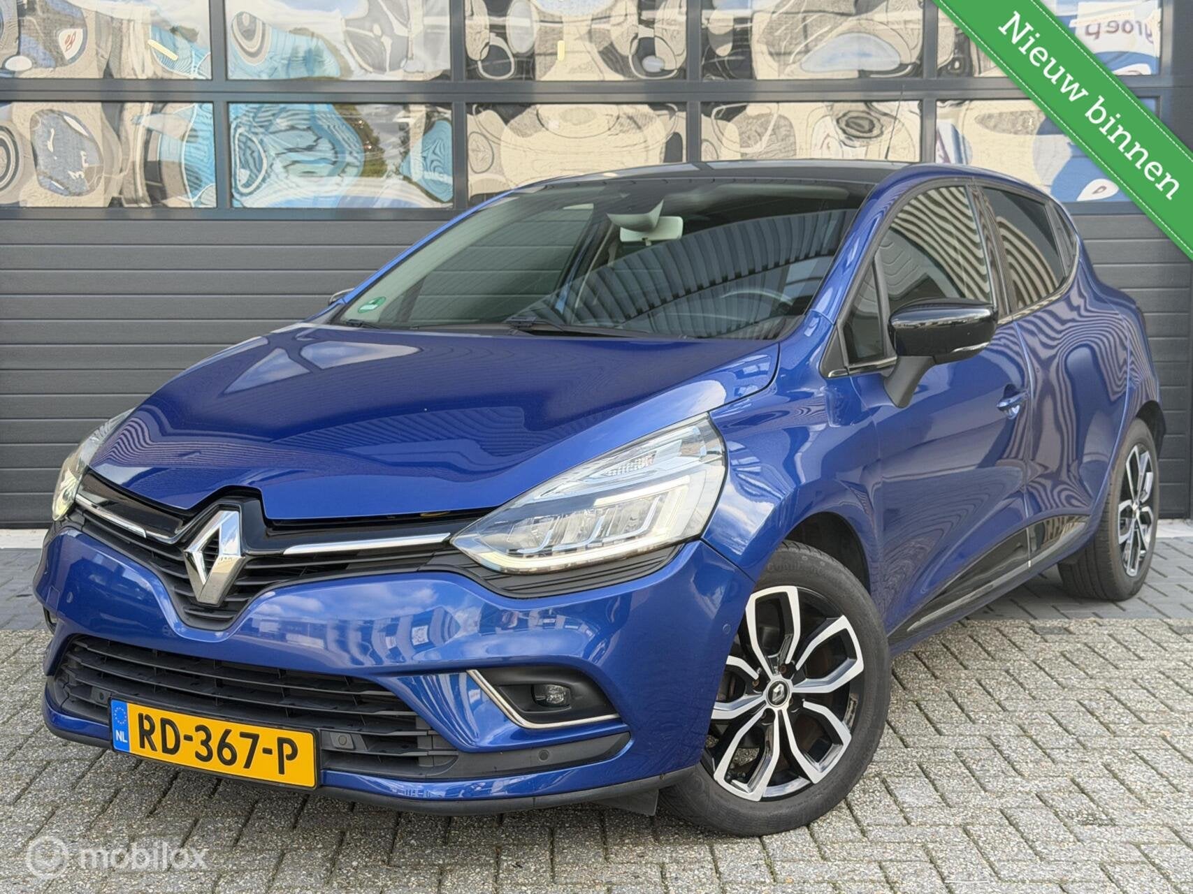 Renault Clio 1.2 TCe Intens | NAP | Camera | Carplay | CC, Auto's, Voorwielaandrijving, Gebruikt, Met garantie (alle), Blauw