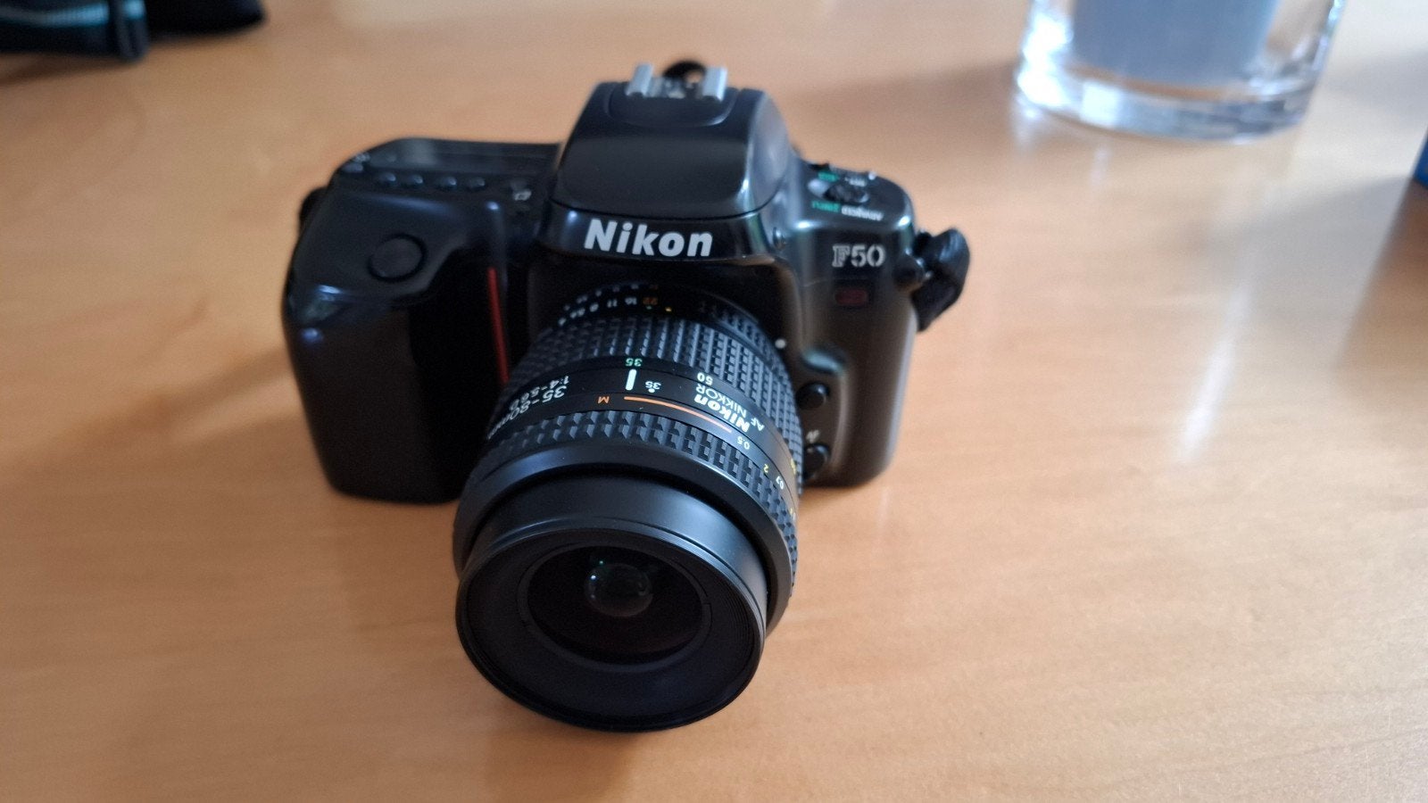 Nikon F50 Spiegelreflexcamera met Cosina 28-210mm lens, Audio, Tv en Foto, Ophalen of Verzenden, Gebruikt