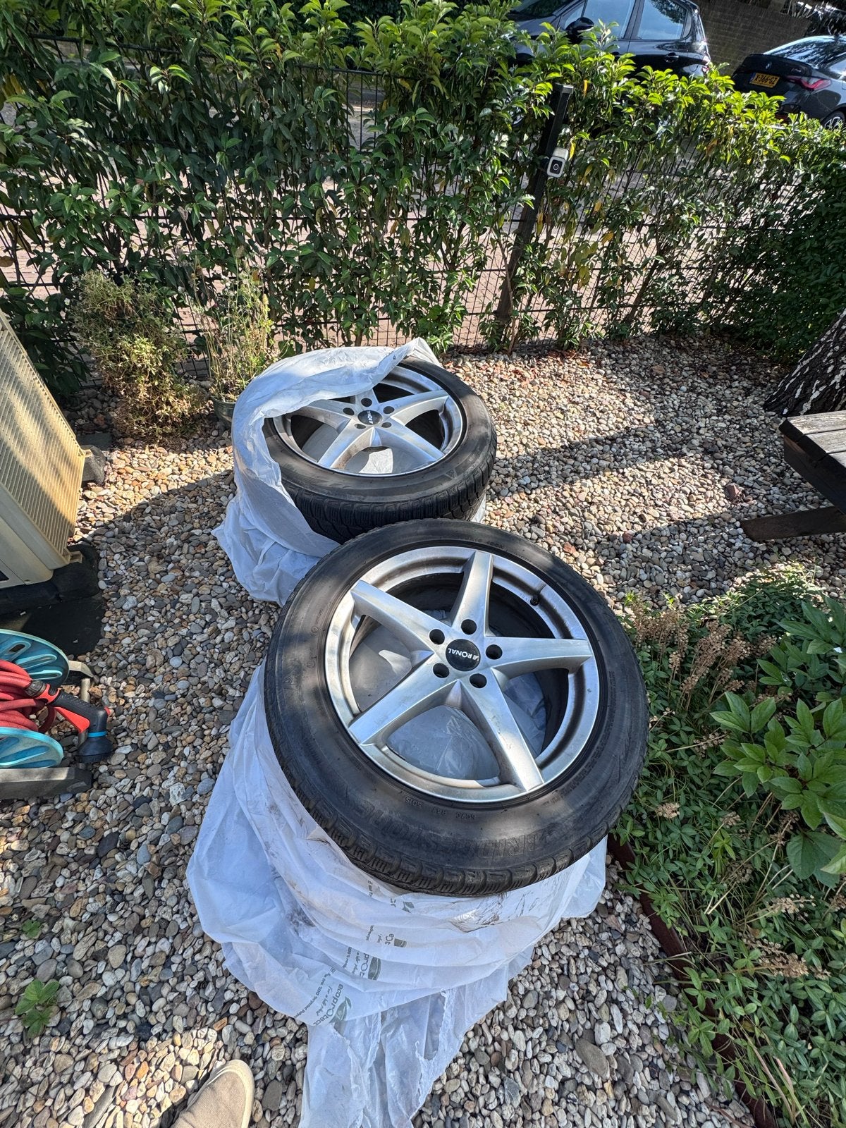 Set van 4 Bridgestone winterbanden met velgen (4-5mm), Ophalen, 18 inch, Gebruikt, Banden en Velgen