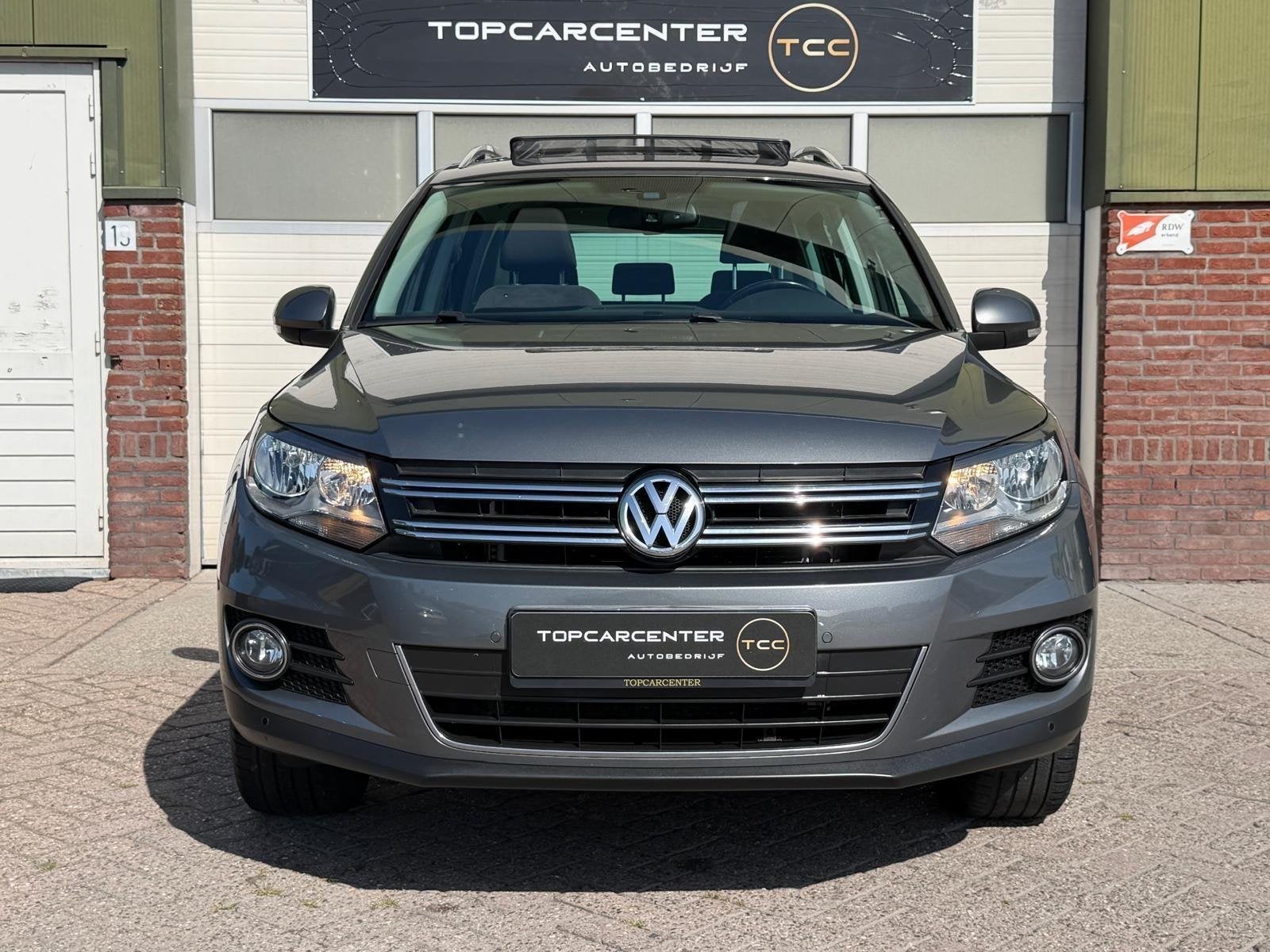 Volkswagen Tiguan 2.0 TSI Sport 4Motion/PANO/NAVI/PARKS/APK, Auto's, Euro 5, Gebruikt, 4 cilinders, Bedrijf