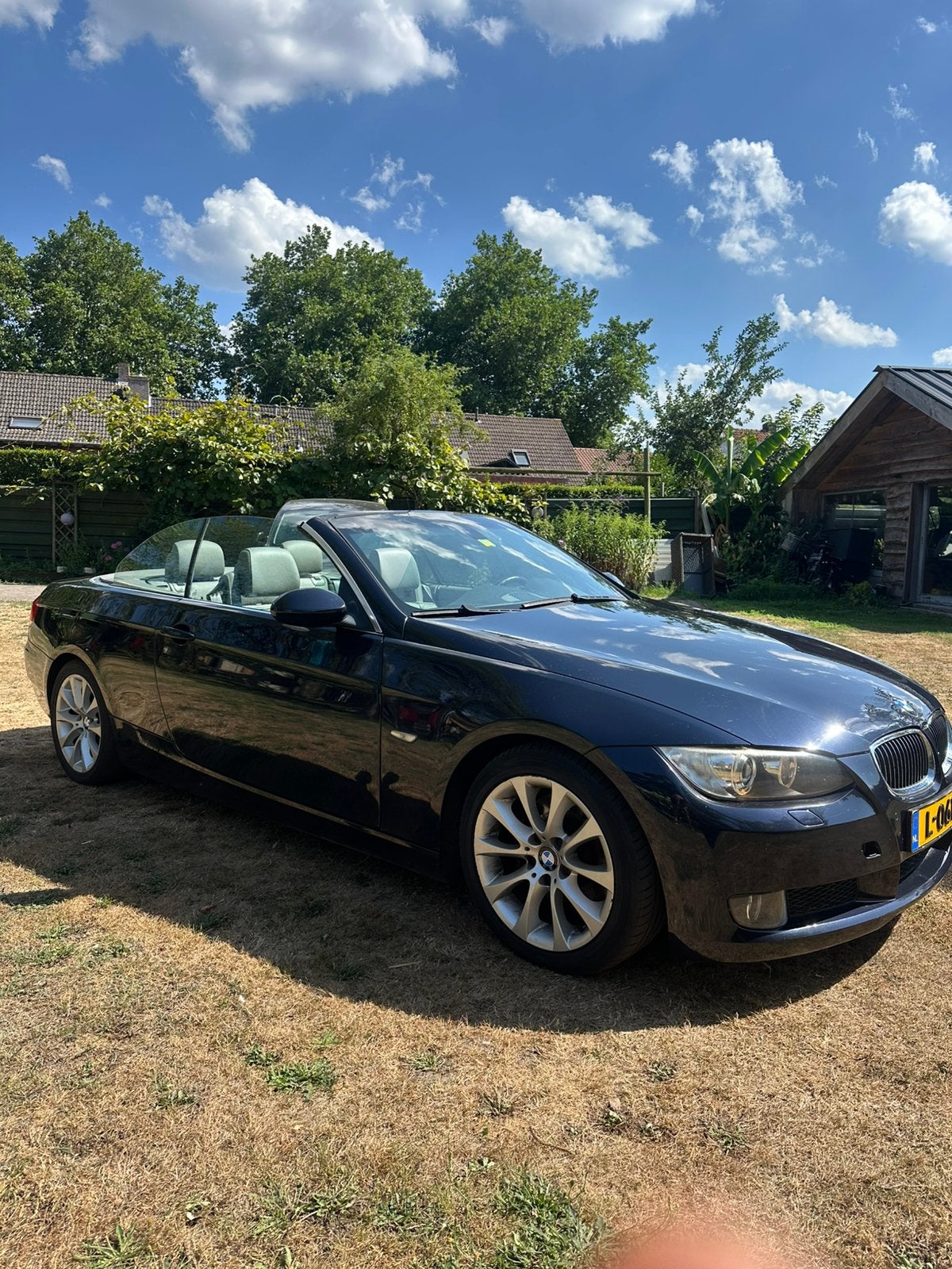 BMW 325i Cabrio Automaat donkerblauw/grijs lederen interieur, 1660 kg, Cabriolet, 2996 cc, 10 km/l