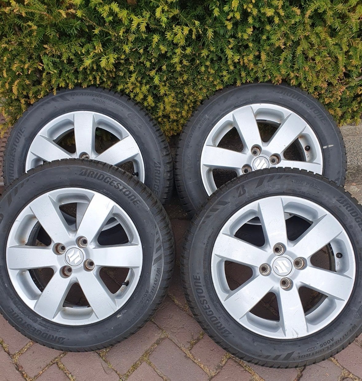 Bridgestone All Season banden met velgen - 185/60R15 zgan, Auto-onderdelen, Ophalen, Gebruikt, 15 inch, Banden en Velgen