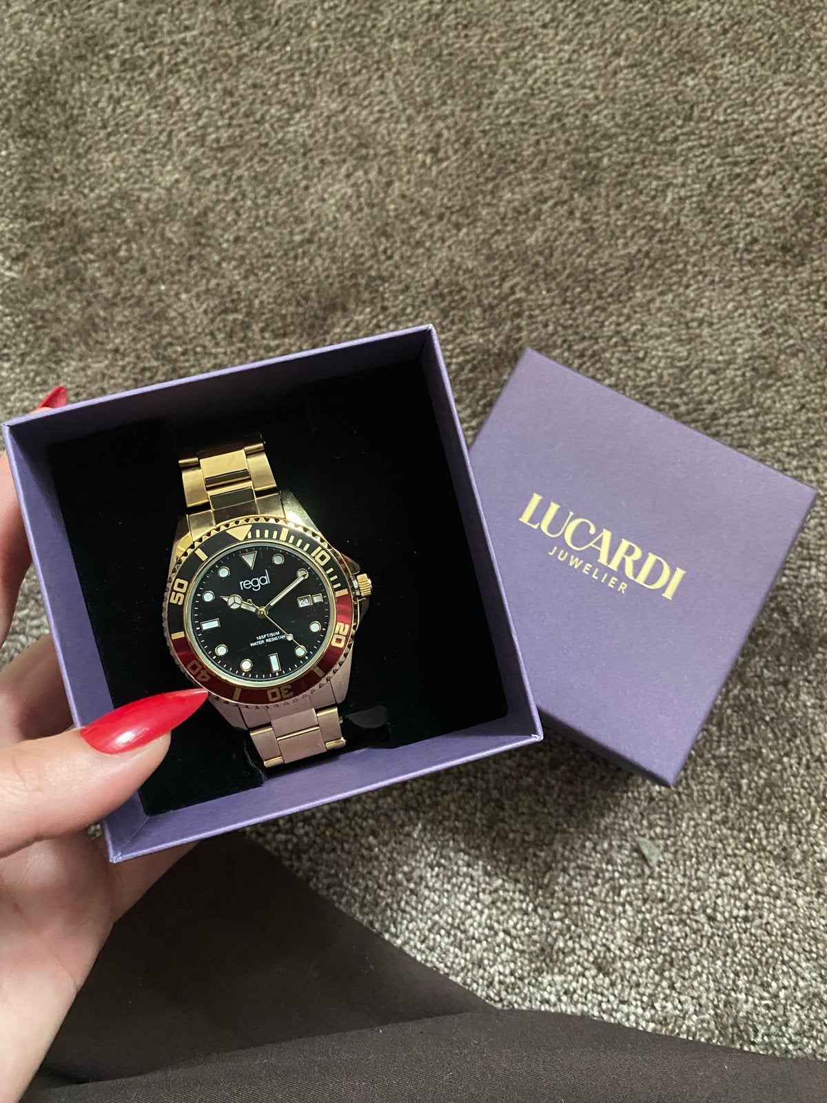 Regal Herenhorloge Goudkleurig met Zwarte Wijzerplaat, Overige merken, Polshorloge, Ophalen of Verzenden, Zo goed als nieuw