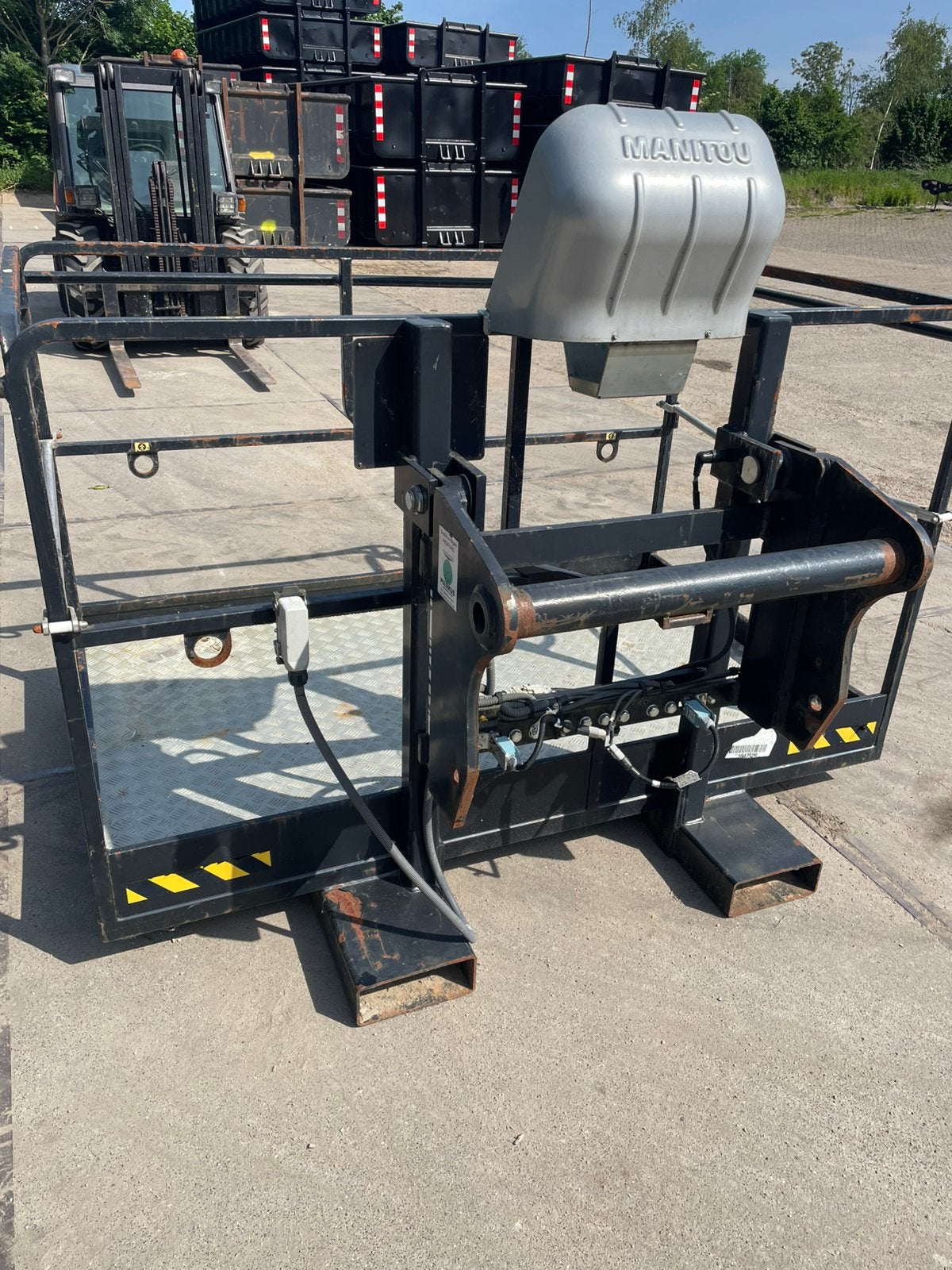 Manitou werkbak / manbak verreiker, Ophalen