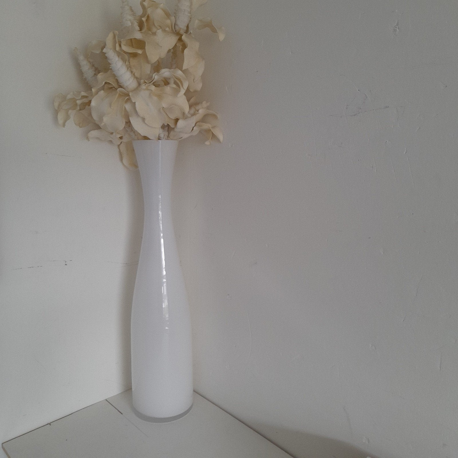grote witte vaas, Ophalen