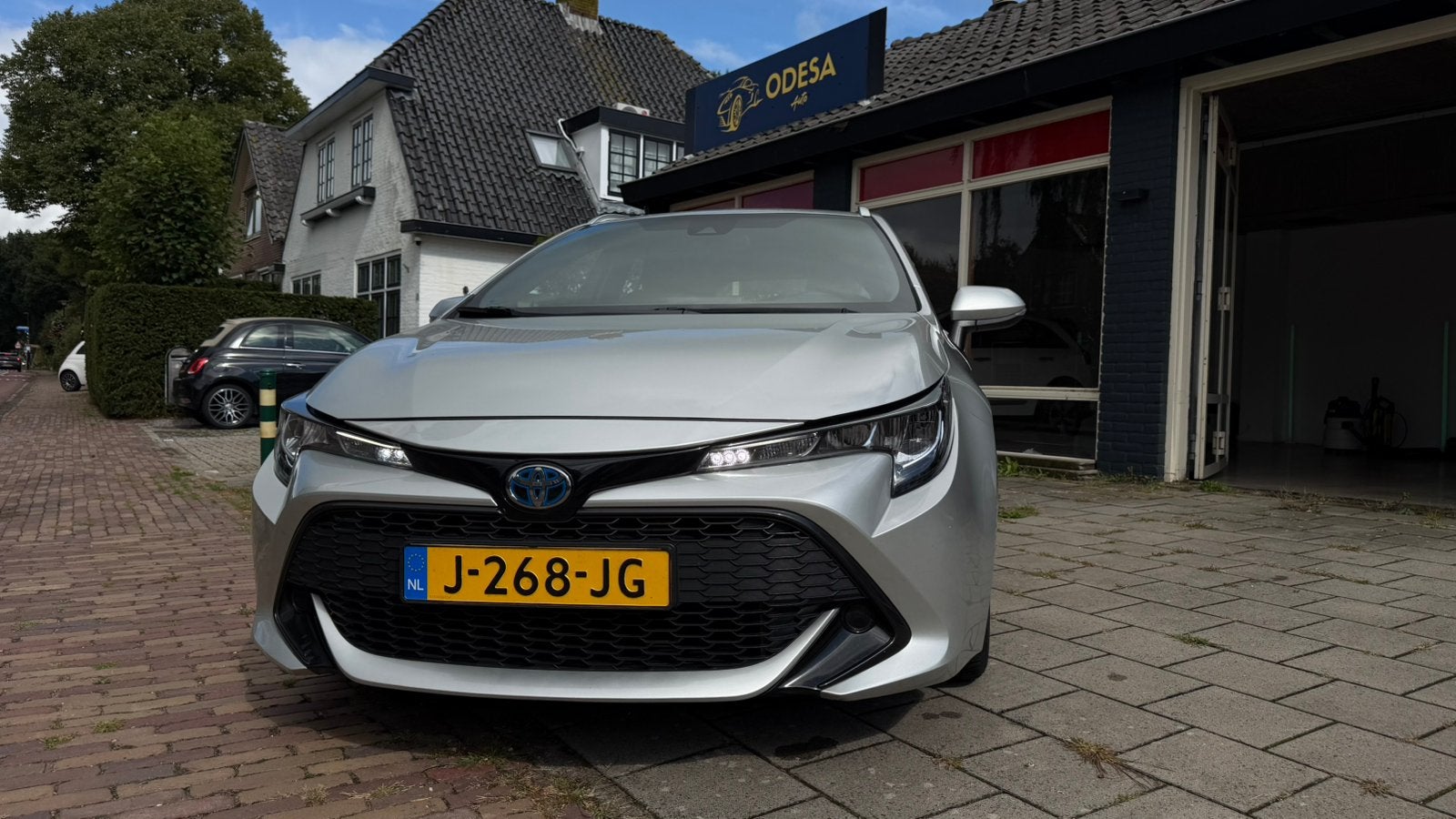 Toyota Corolla TS 1.8 Hybrid 122pk CVT 2020 Grijs, Grijs, Te koop, Apple Carplay, Volledig hybride