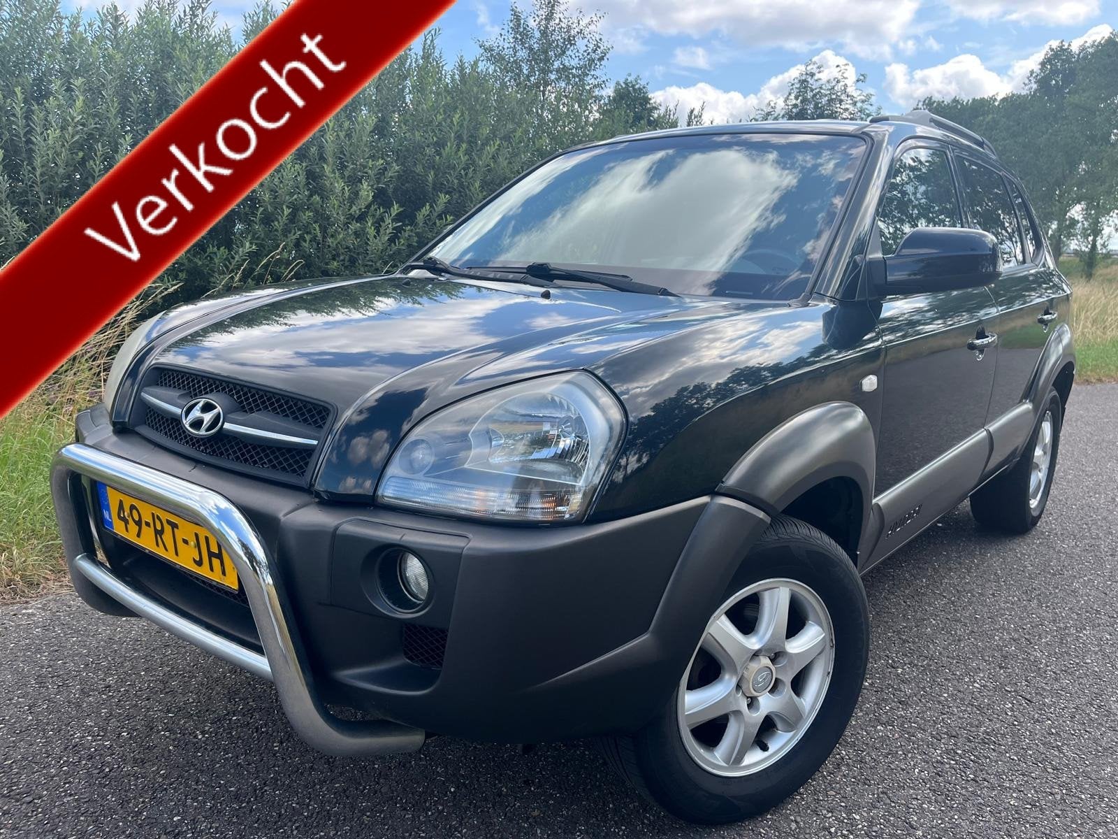 Hyundai Tucson 2.0i | Airco | Cruise | Trekhaak | APK mei 20, Auto's, Gebruikt, 4 cilinders, Zwart, Origineel Nederlands