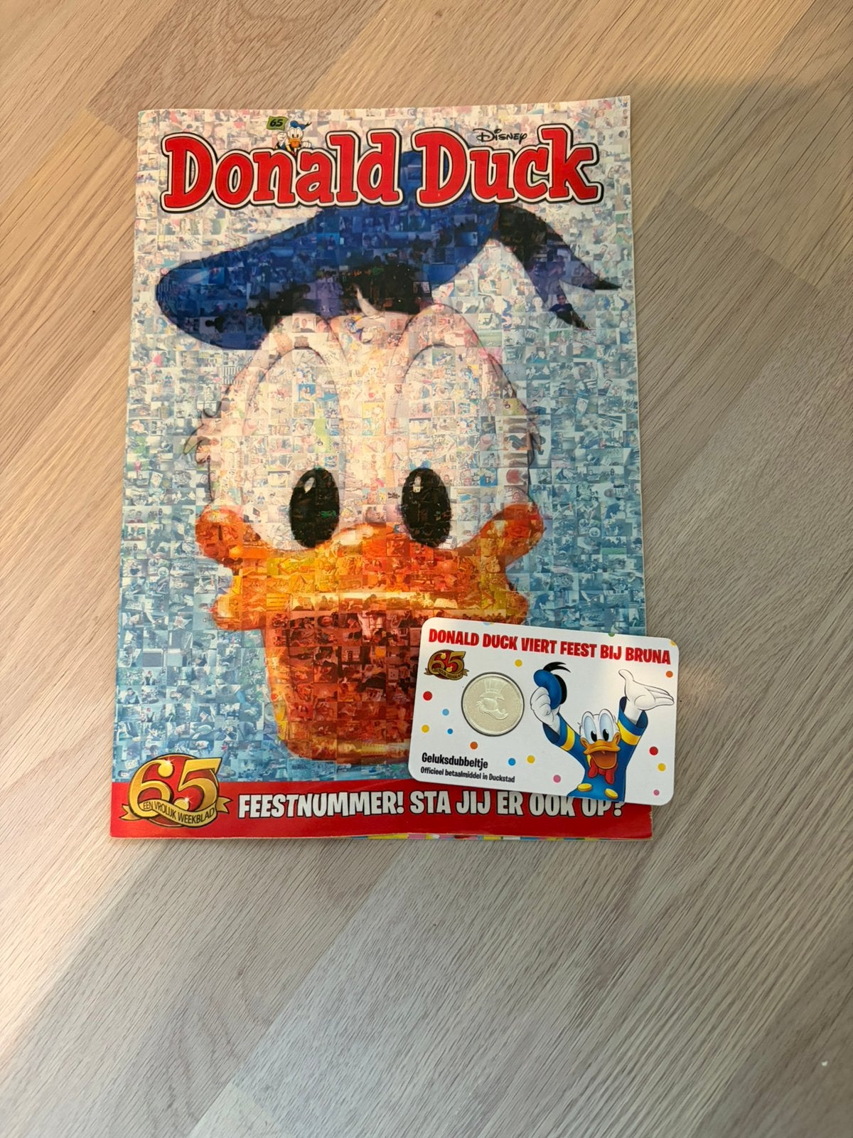 Donald duck 65 jaar editie + munt., Eén stripboek, Ophalen of Verzenden, Gelezen