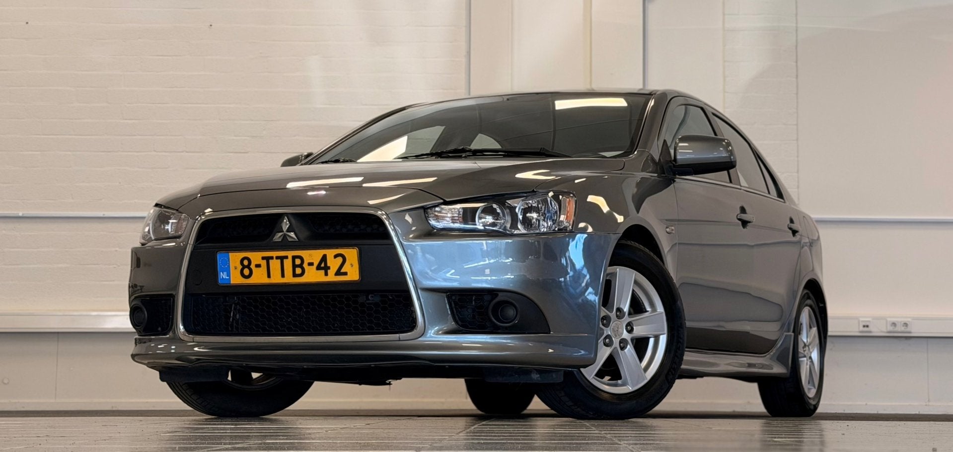 Mitsubishi Lancer Sportback 1.6 Limited Edition Nieuw staat, Auto's, Voorwielaandrijving, Euro 5, Stof, Gebruikt
