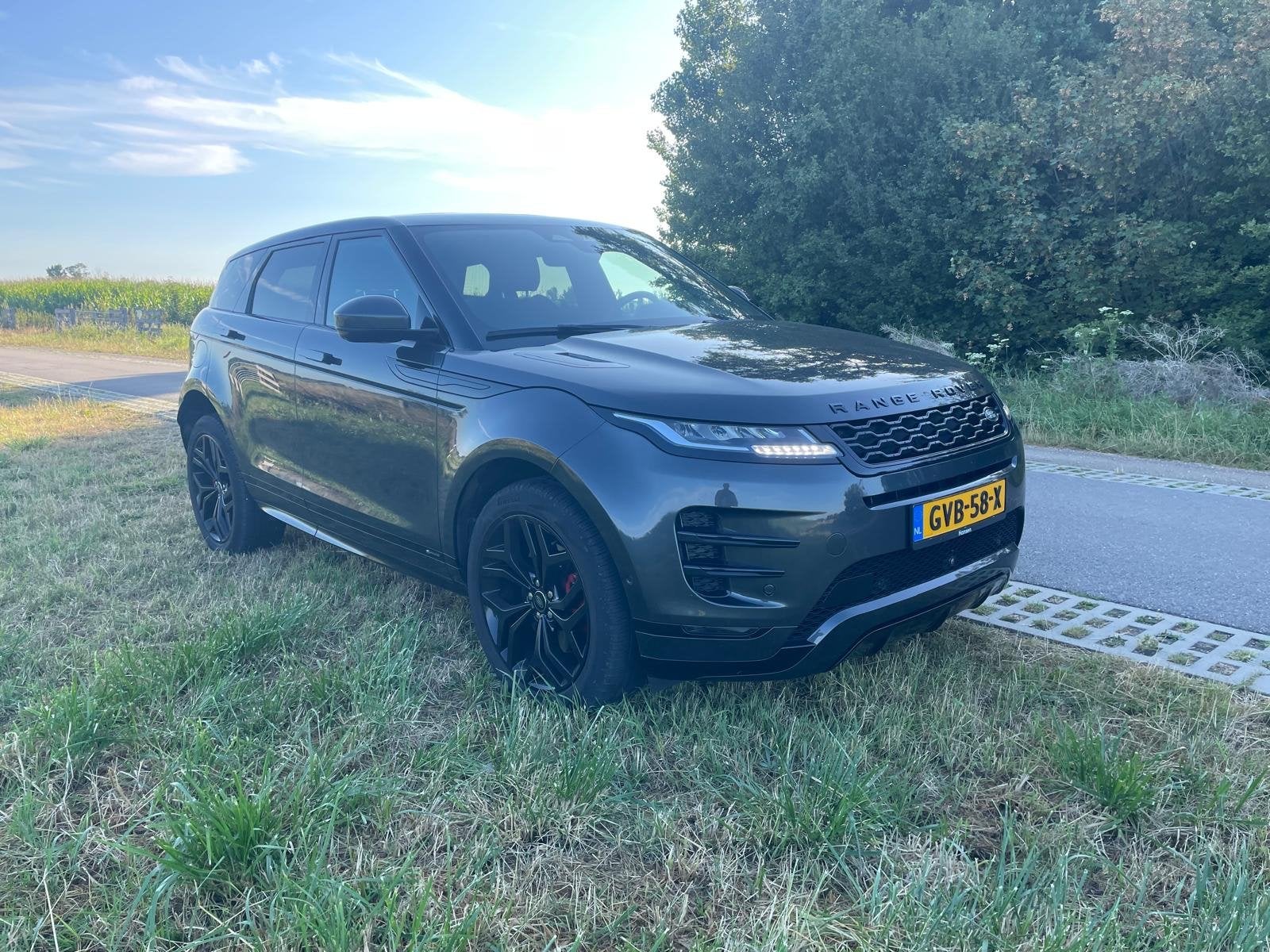 Land Rover Range Rover Evoque P300 300pk AWD Aut 2021 Grijs, Automaat, 1800 kg, Zwart, 4 cilinders