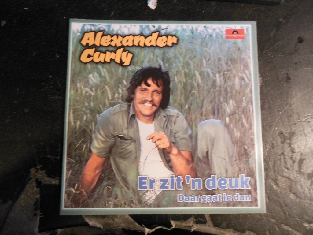 Alexander Curly - Er zit 'n deuk, 7 inch, Ophalen of Verzenden, Fotohoes, Nieuw in verpakking