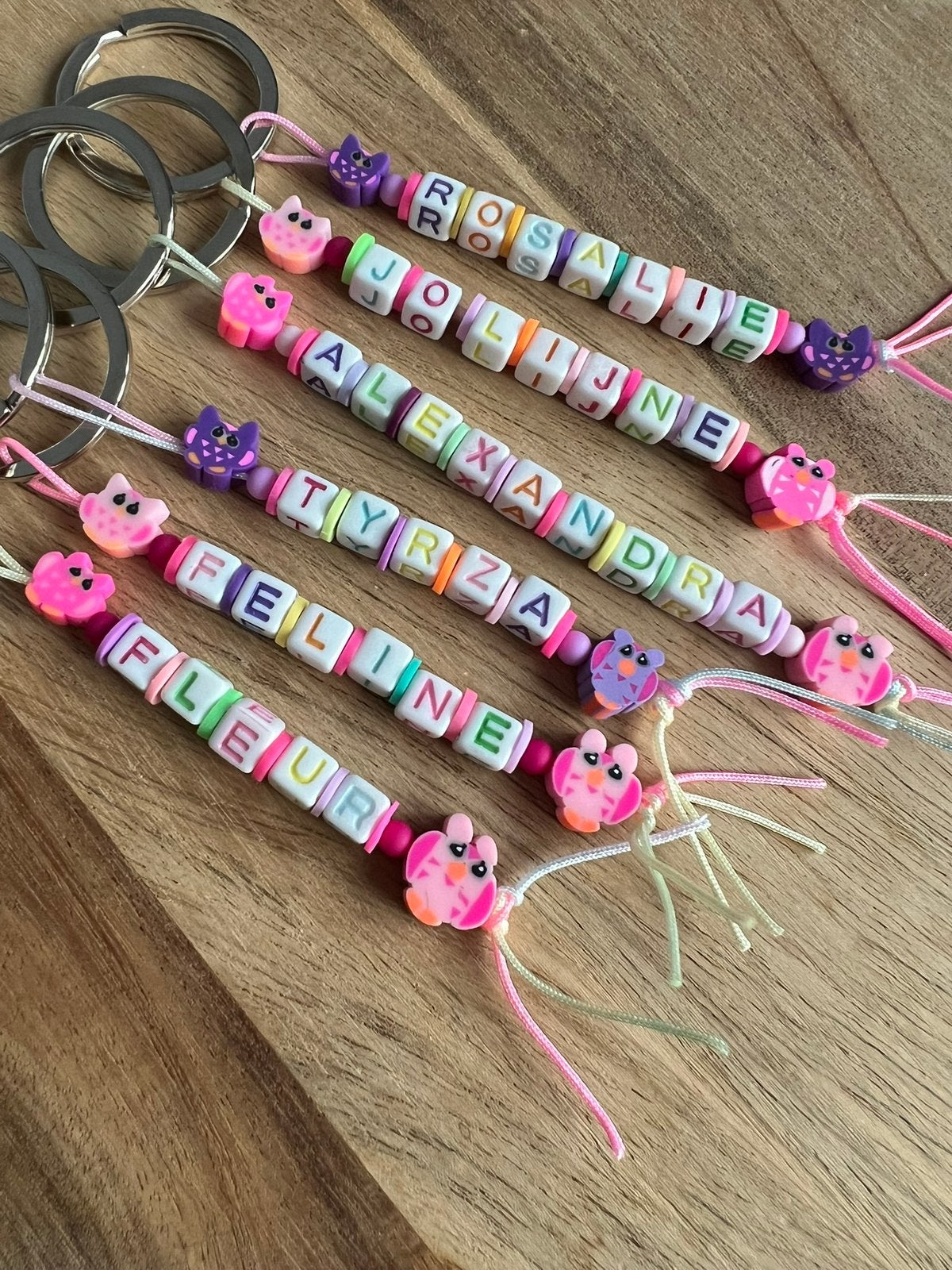 Uiltjes sleutelhangers met naam LEUK TRAKTEREN, Ophalen of Verzenden, Nieuw, Feestartikel, Verjaardag