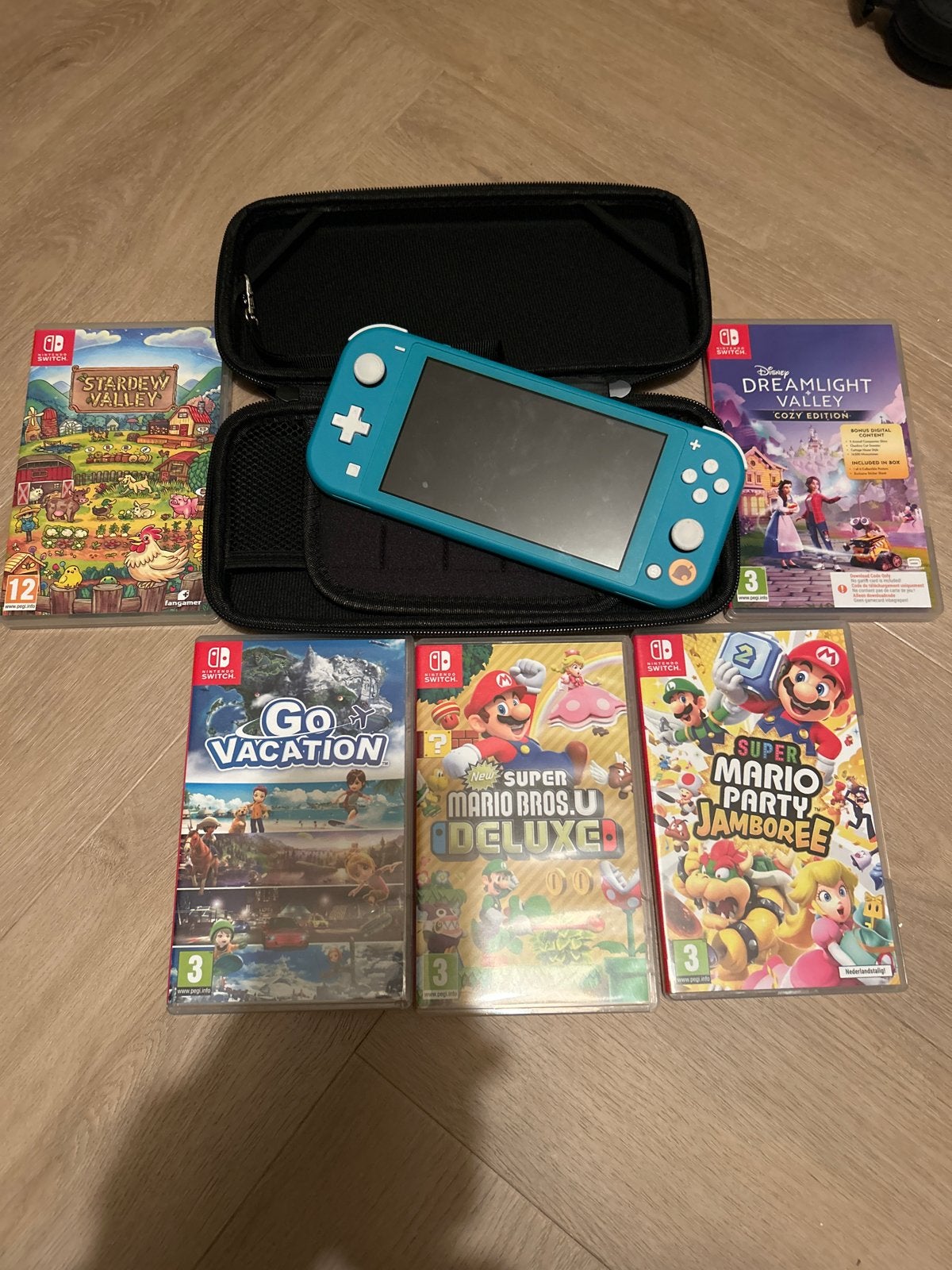 Nintendo Switch Lite met 6 spellen en originele oplader, Ophalen of Verzenden, Gebruikt, Met games, Switch Original