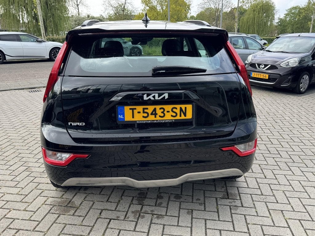 Kia Niro EV DynamicLine 64.8 kWh Nav|Camera|Lmv, Auto's, Gebruikt, 750 kg, 1657 kg, Leder en Stof