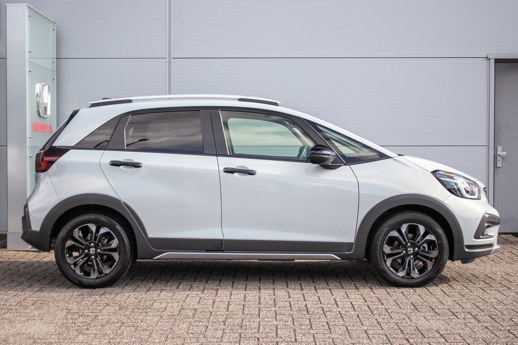 Honda Jazz 1.5 e:HEV Advance Crosstar -Navi | Apple/Android, Auto's, Honda, 12 maanden, Zwart, Leder en Stof, Bedrijf