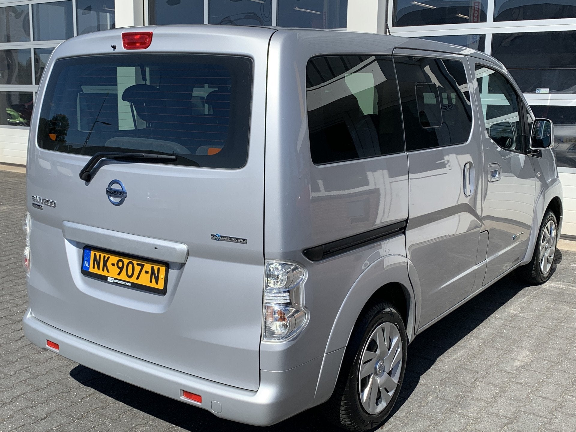 Nissan E-NV200 80KW 24 kWh Evalia 7-persoons Climate control, Auto's, Nissan, Stof, Gebruikt, Zwart, 1514 kg