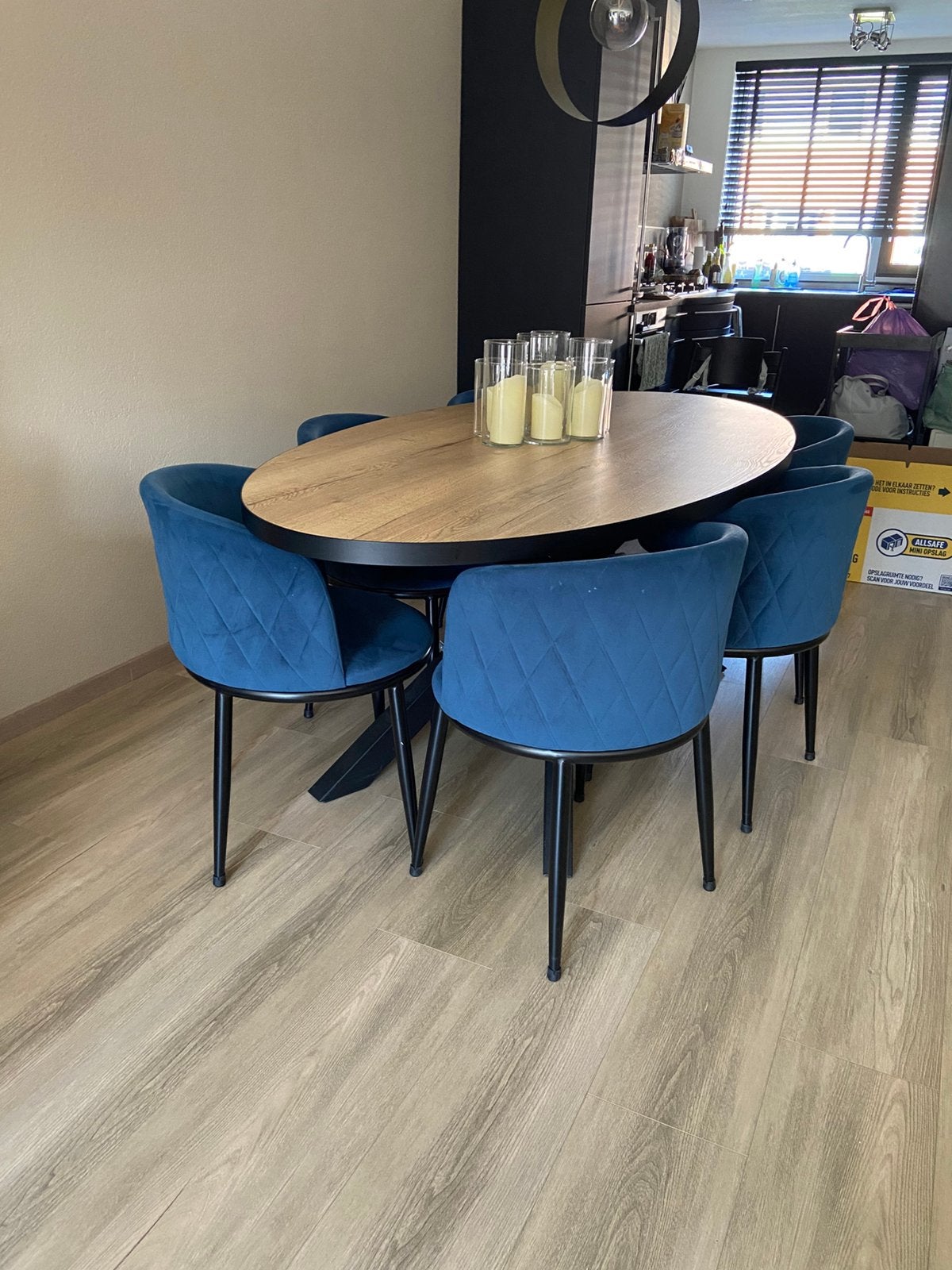 Ovale eettafel houtlook blad stalen poten, Ophalen, Kunststof, Gebruikt, 100 tot 150 cm
