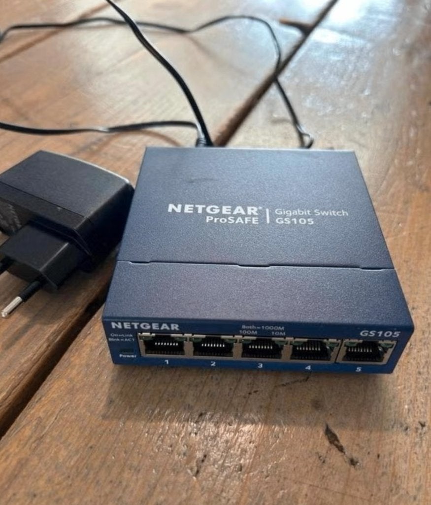 Netgear ProSafe GS105 gigabit switch, Computers en Software, Dockingstations, Ophalen of Verzenden, Gebruikt, Docking station