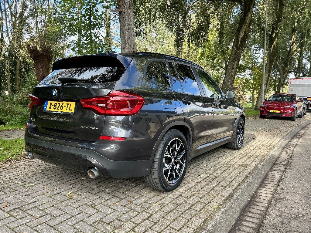BMW X3 Xdrive30e 292pk Aut 2020 Sophistograu Plug-in Hybride, Automaat, 1998 cc, Stof, Zwart