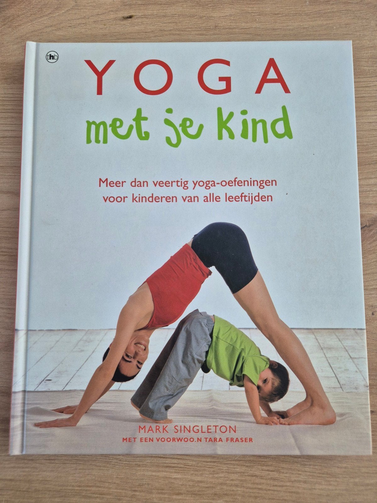M. Singleton - Yoga met je kind, Meditatie of Yoga, Ophalen of Verzenden, Zo goed als nieuw, M. Singleton