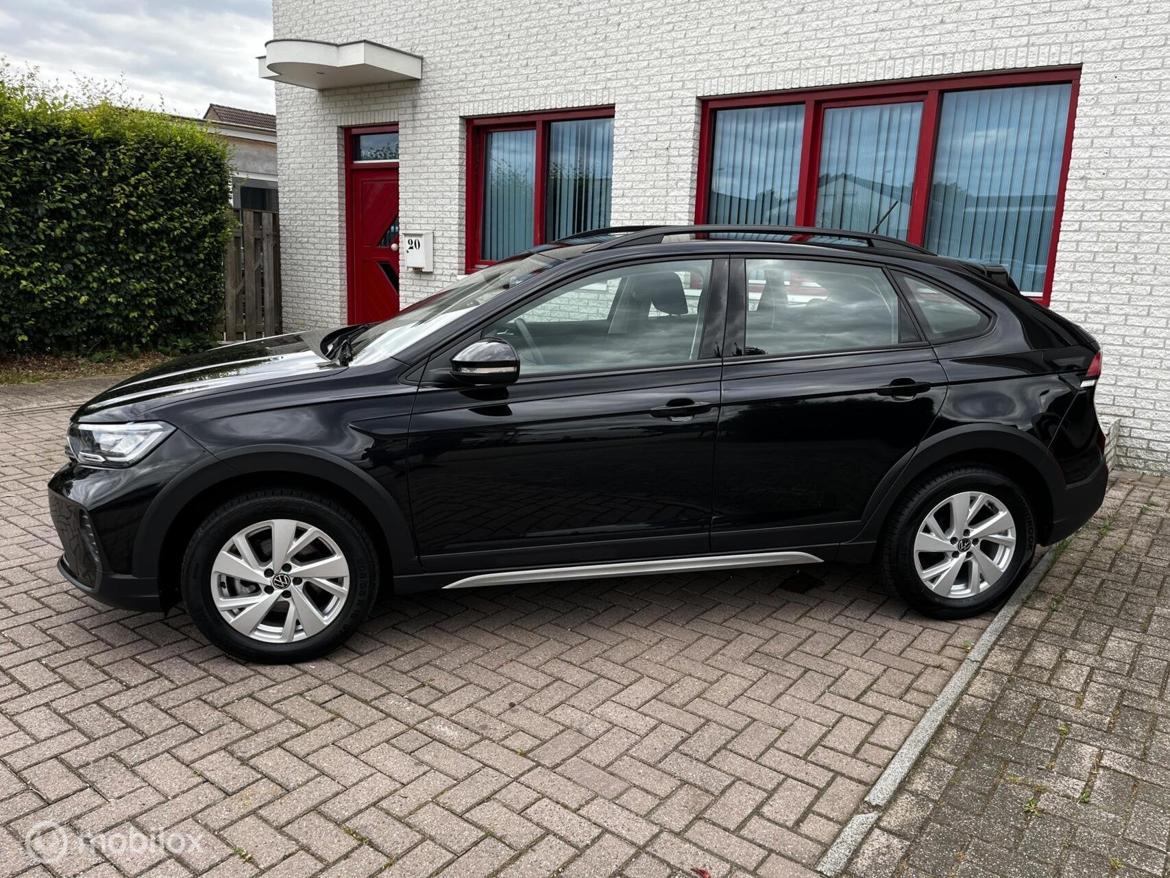Volkswagen Taigo 1.0 TSI Edition NAVI/CRUISE/CAMERA/PDC, Auto's, Stof, Gebruikt, Zwart, 95 pk