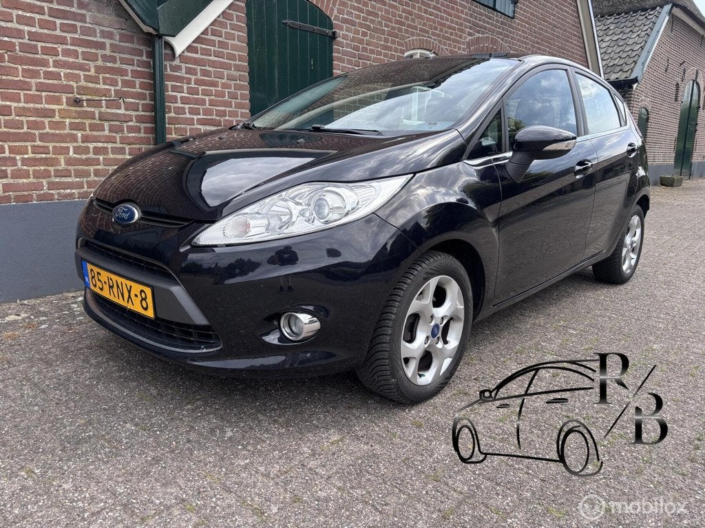 Ford Fiesta 1.4 Titanium LPG 2011 GOED ONDERHOUDEN UNIEK, Auto's, Ford, Voorwielaandrijving, Euro 5, Stof, Gebruikt