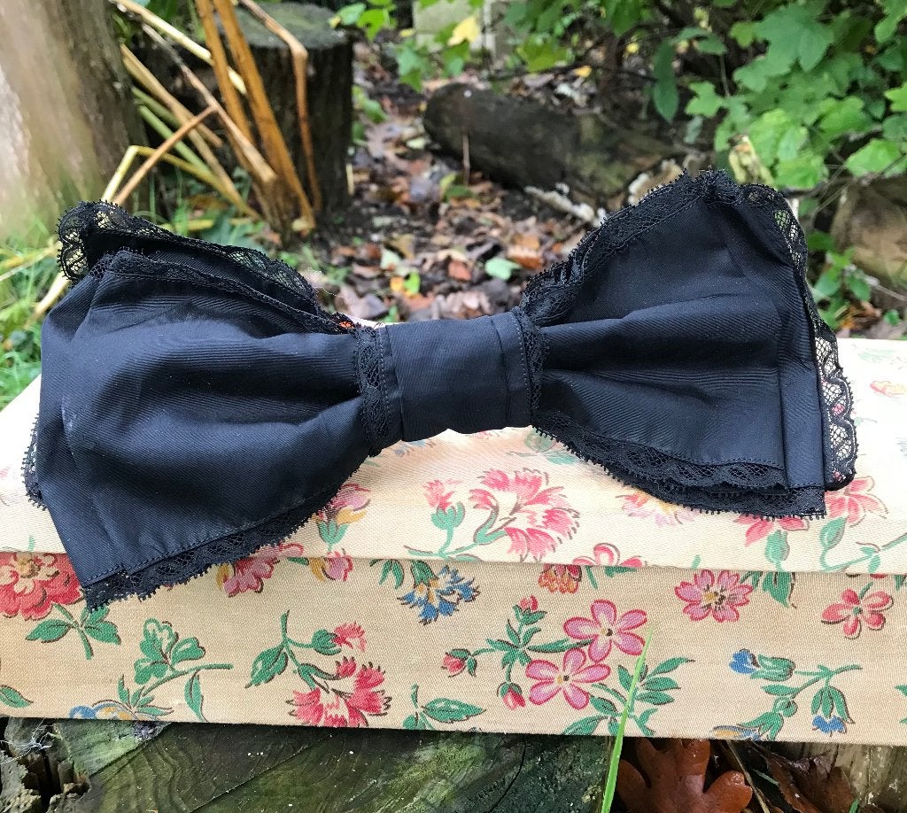 Haarspeld met een zwarte strik - 25 cm - vintage, Ophalen of Verzenden, Zo goed als nieuw, Haarspeld