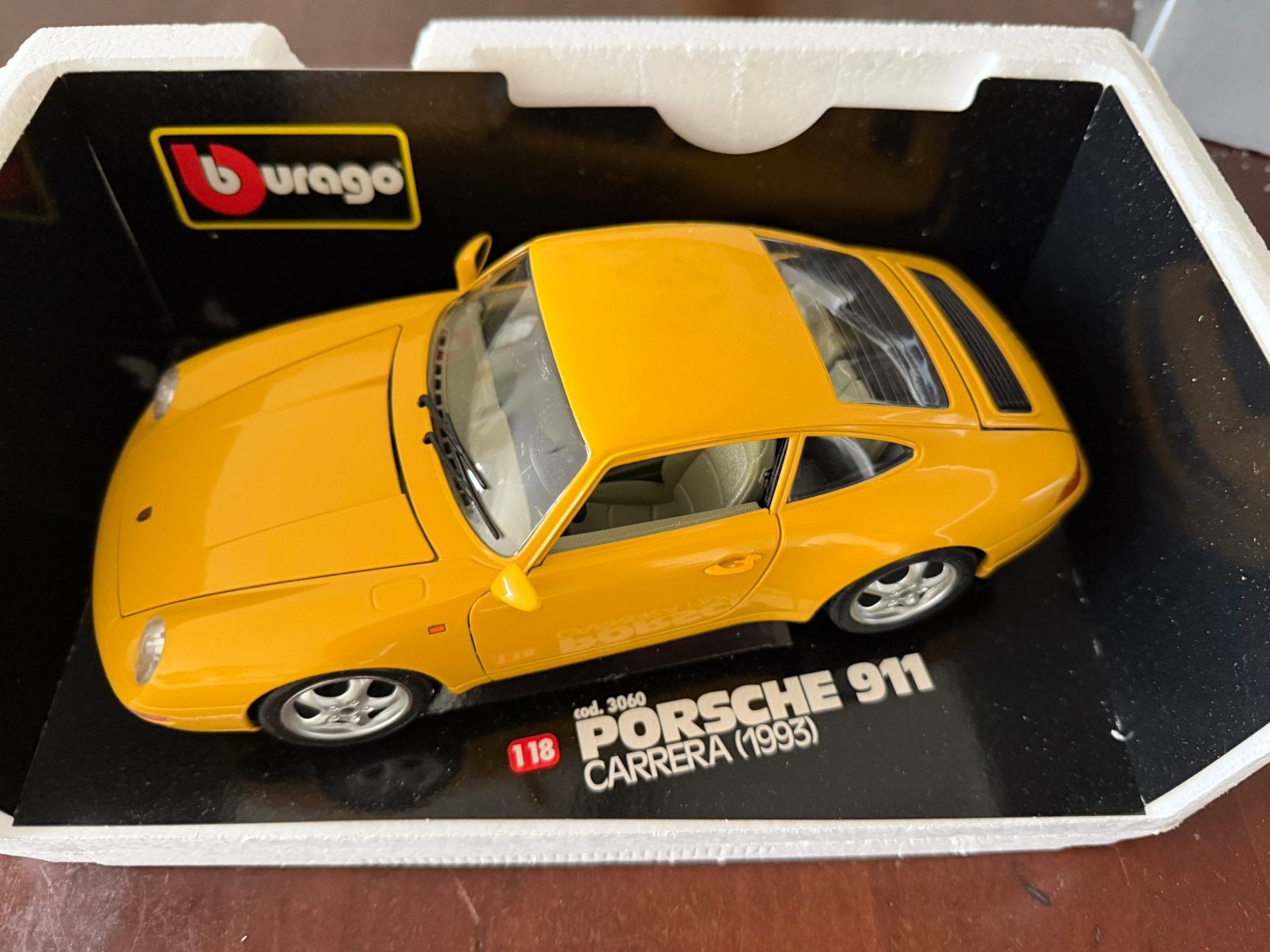 Bburago Porsche 911 Carrera geel 1993 nieuw in doos, Ophalen of Verzenden, Zo goed als nieuw, Bburago