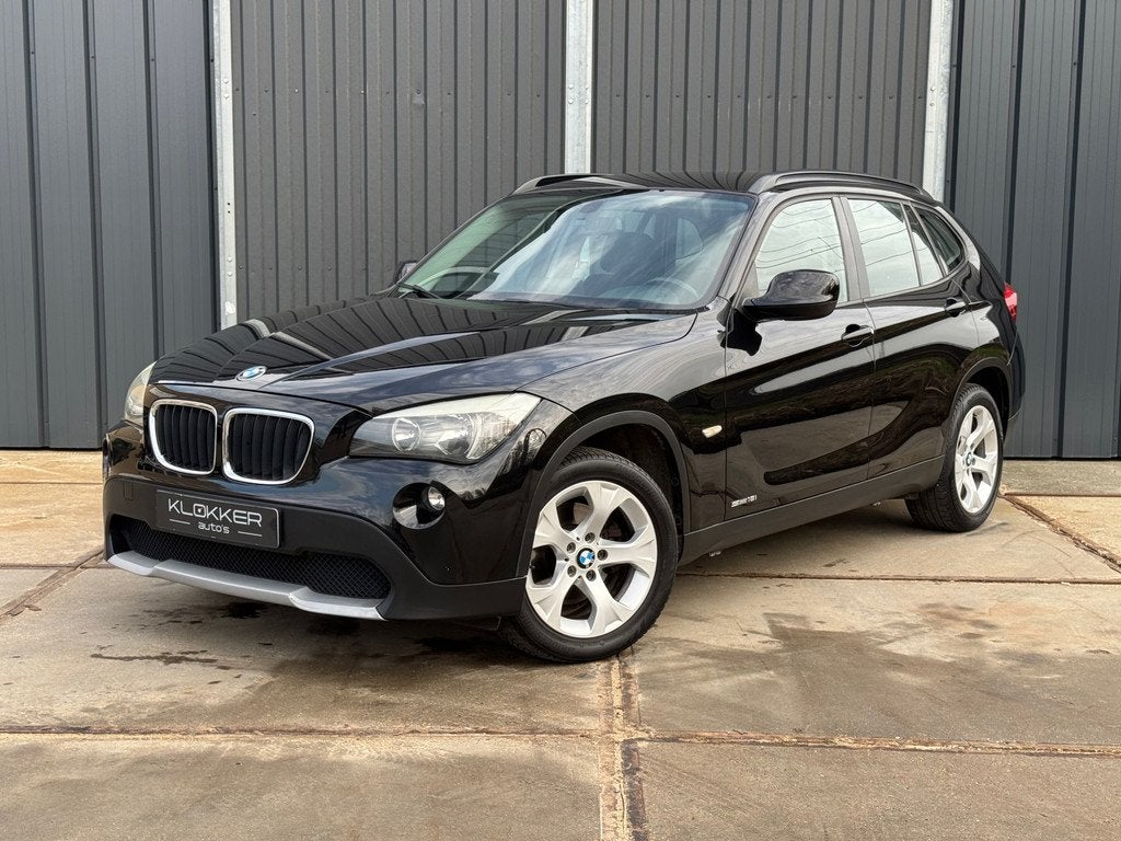 BMW X1 SDrive18i Carplay|Clima|PDC|Trekhaak, X1, Euro 5, Zwart, 4 cilinders