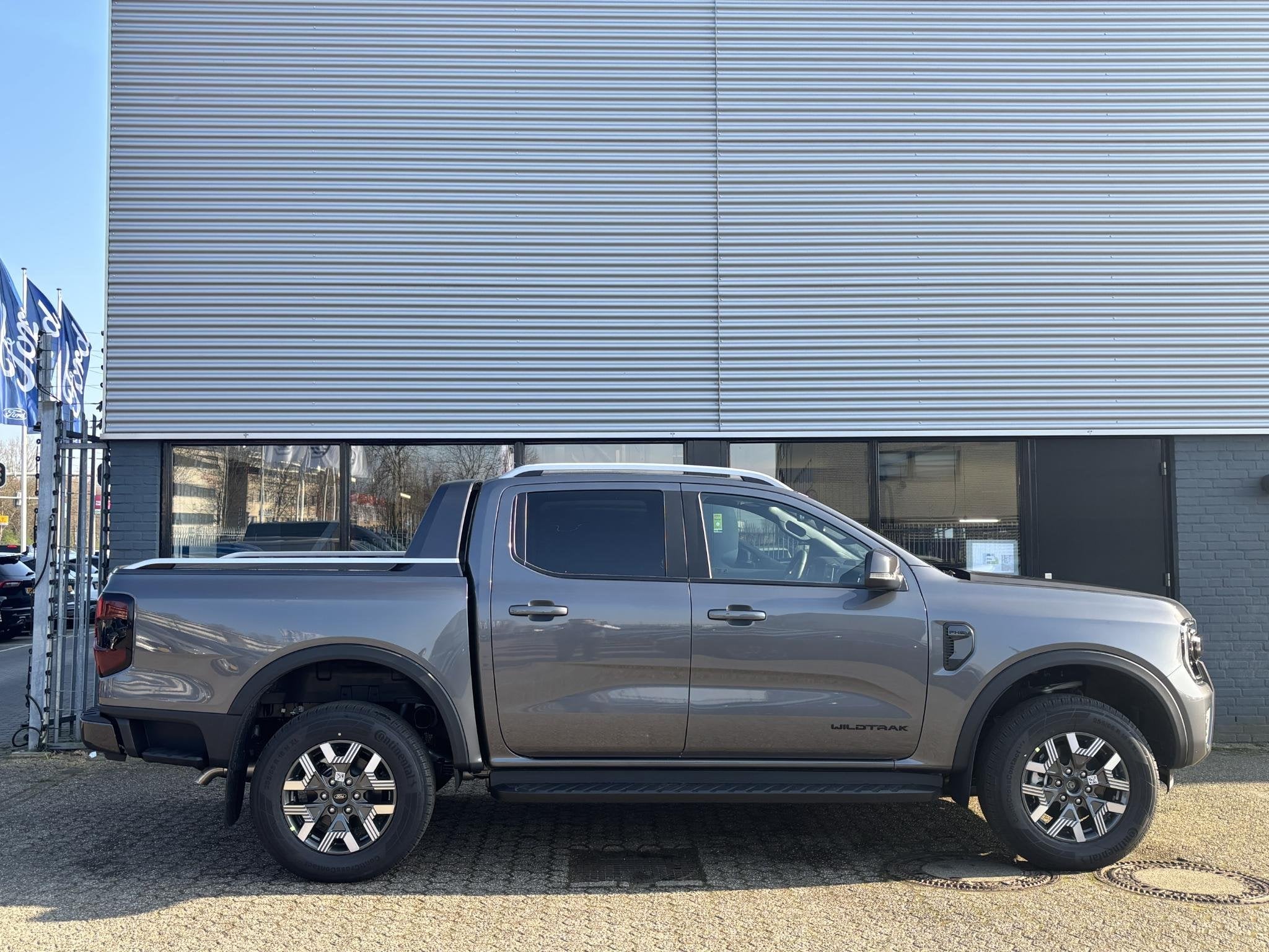 Ford Ranger Wildtrak Double Cab PHEV | DIRECT LEVERBAAR | 27, Auto's, Ford, Stof, 4 cilinders, Origineel Nederlands, Bedrijf