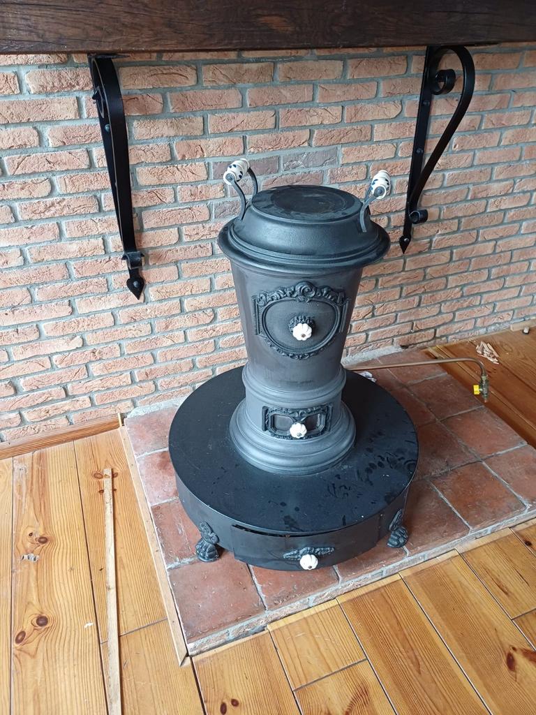Antieke Kolenkachel - Vrijstaand en Decoratief, Huis en Inrichting, Ophalen, Gebruikt, Gas, Vrijstaand