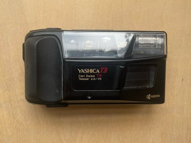 Yashica T3 werkend met originele hoes, Ophalen, Gebruikt, Compact, Overige Merken