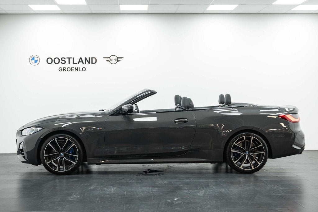 BMW 4 Serie Cabrio M440i Automaat / Laserlight / Harman Kard, Auto's, BMW, Achterwielaandrijving, Gebruikt, Zwart, 4-Serie