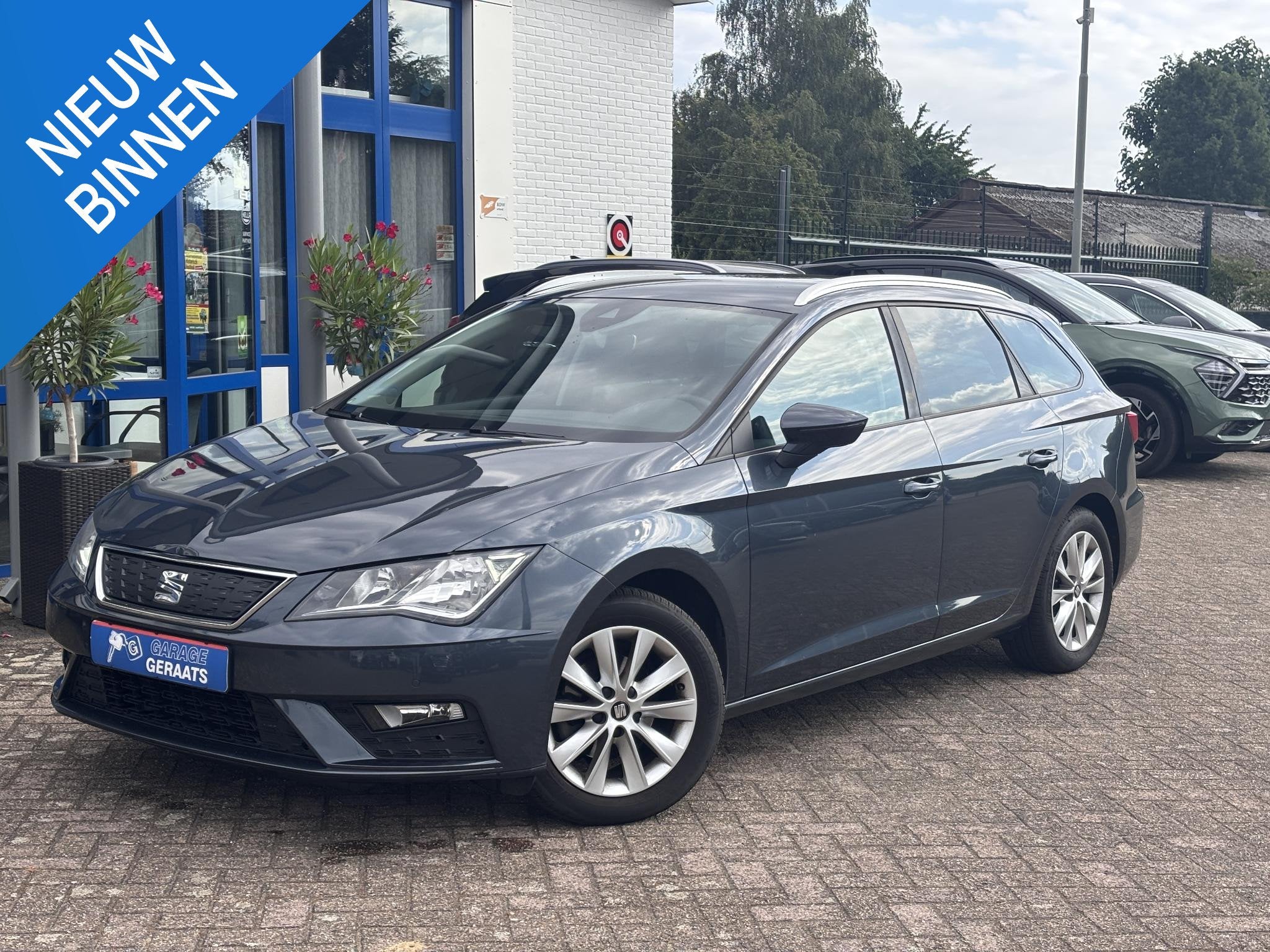 SEAT Leon ST 1.0 EcoTSI Style Business Intense l Camera, Par, Auto's, Stof, Gebruikt, Euro 6, Leon
