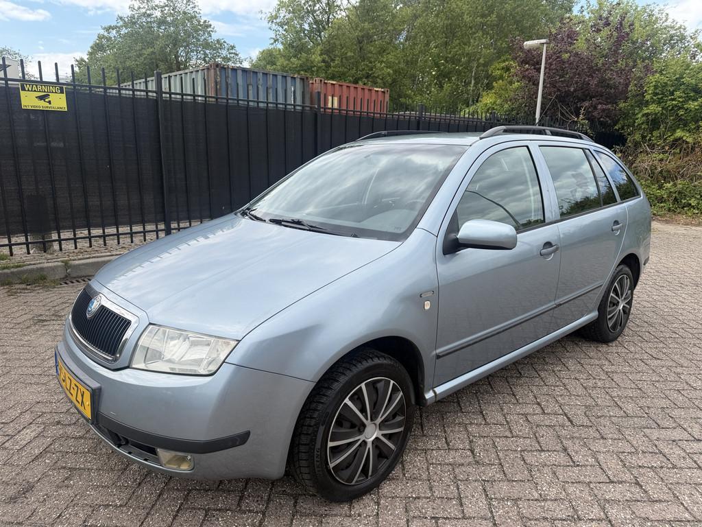 Skoda Fabia Combi 1.4-16V Comfort Airco/Cruise NW APK, Auto's, Voorwielaandrijving, Gebruikt, Zwart, 4 cilinders
