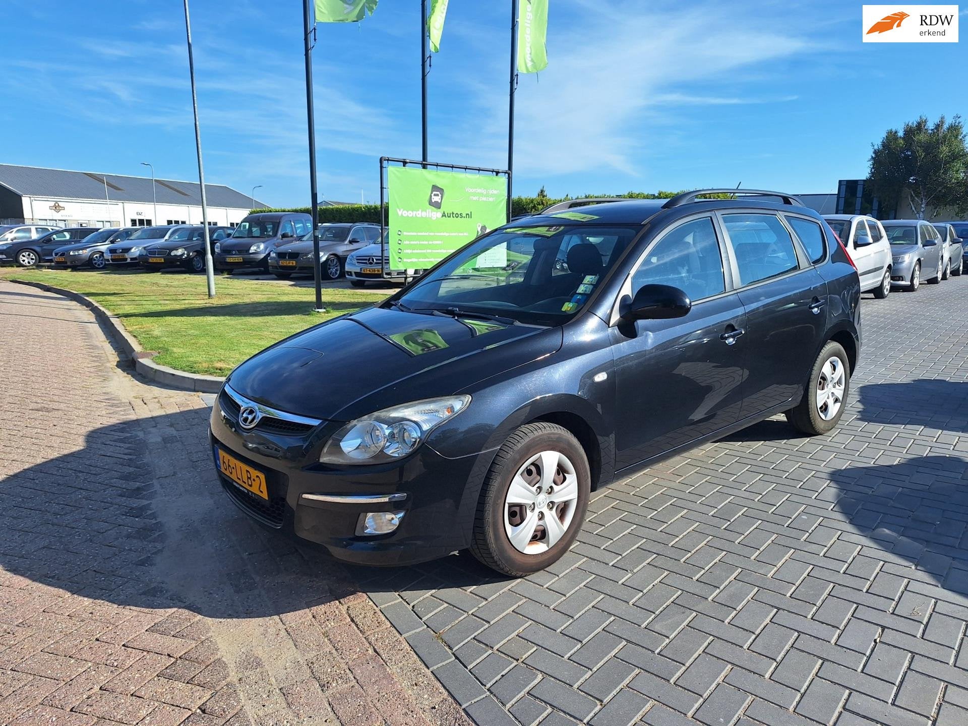 Hyundai I30 CW 1.6i Dynamic / Dealer onderhouden / APK juni, Gebruikt, 1591 cc, 4 cilinders, Zwart