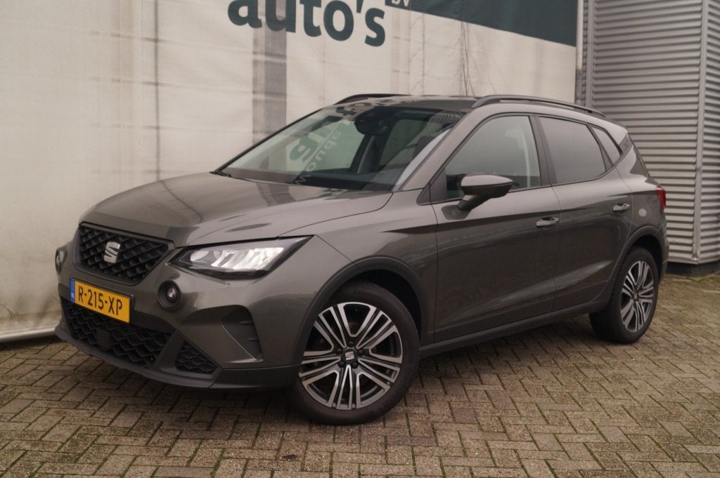 SEAT Arona 1.0 TSI Style Limited -ECC-PDC-CRUISE- (bj 2022), Auto's, Dealer onderhouden, Stof, Gebruikt, 95 pk